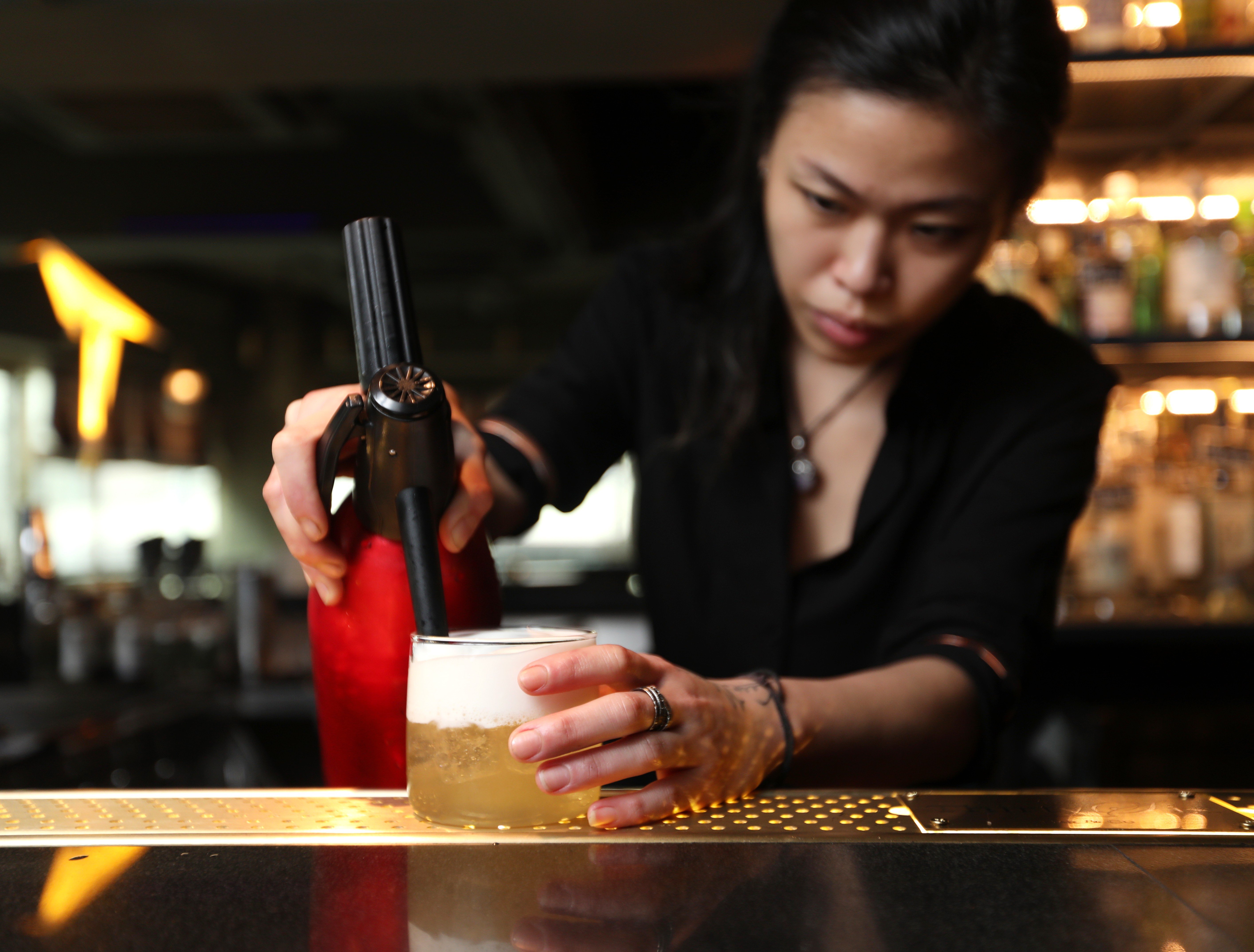 ThirtySix Bar & Co head bartender Heidi Hou pours a B for Mayor’s Boilermaker. Photo: Xiaomei Chen