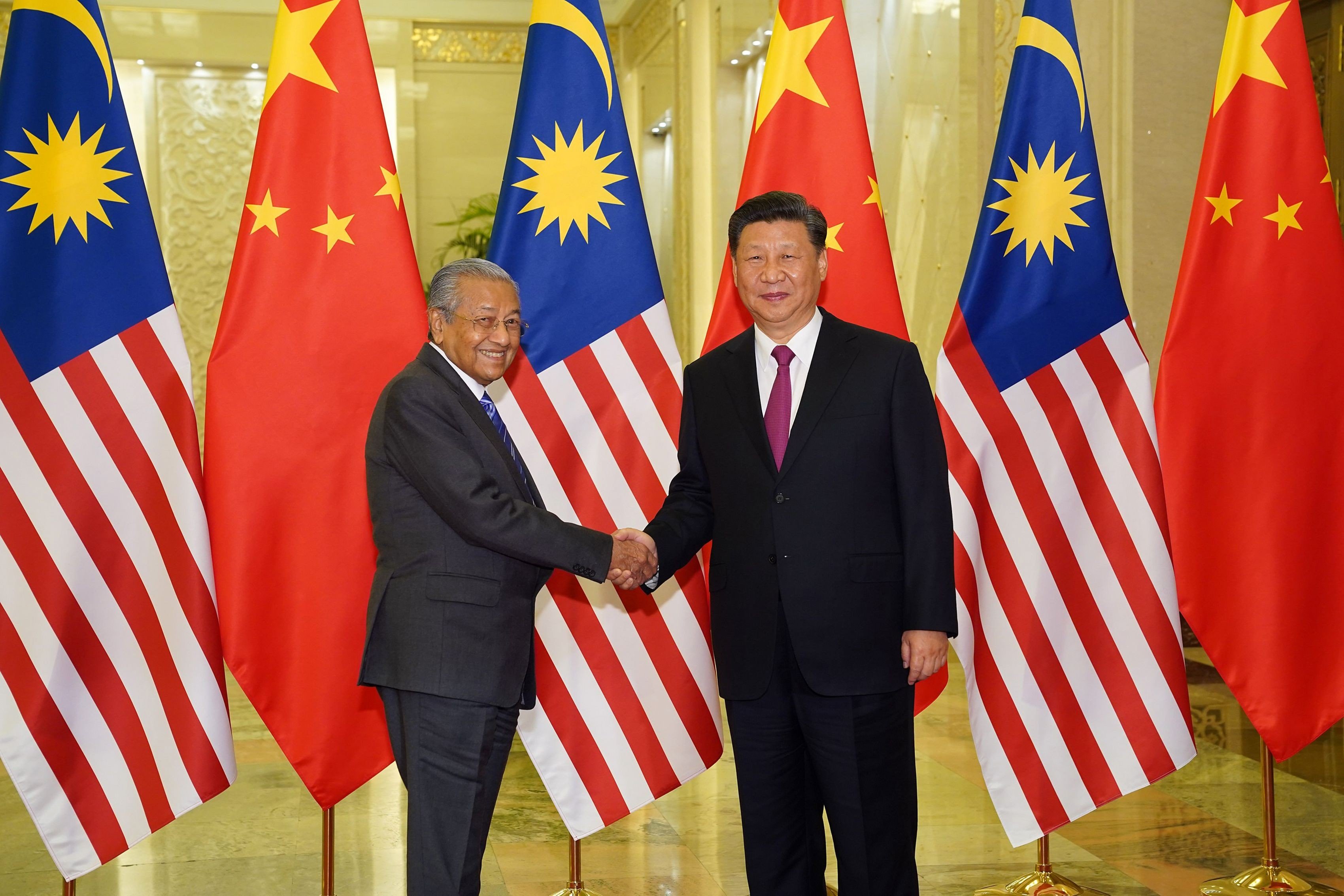 Malaysian PM Mahathir Mohamad with Chinese President Xi Jinping. Photo: AFP