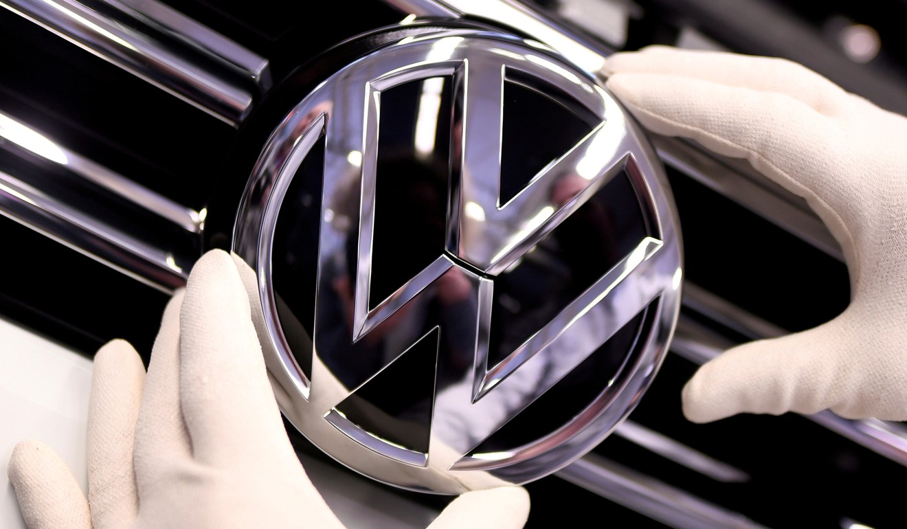 A Volkswagen badge on a production line at the Volkswagen plant in Wolfsburg, Germany. Photo: Reuters