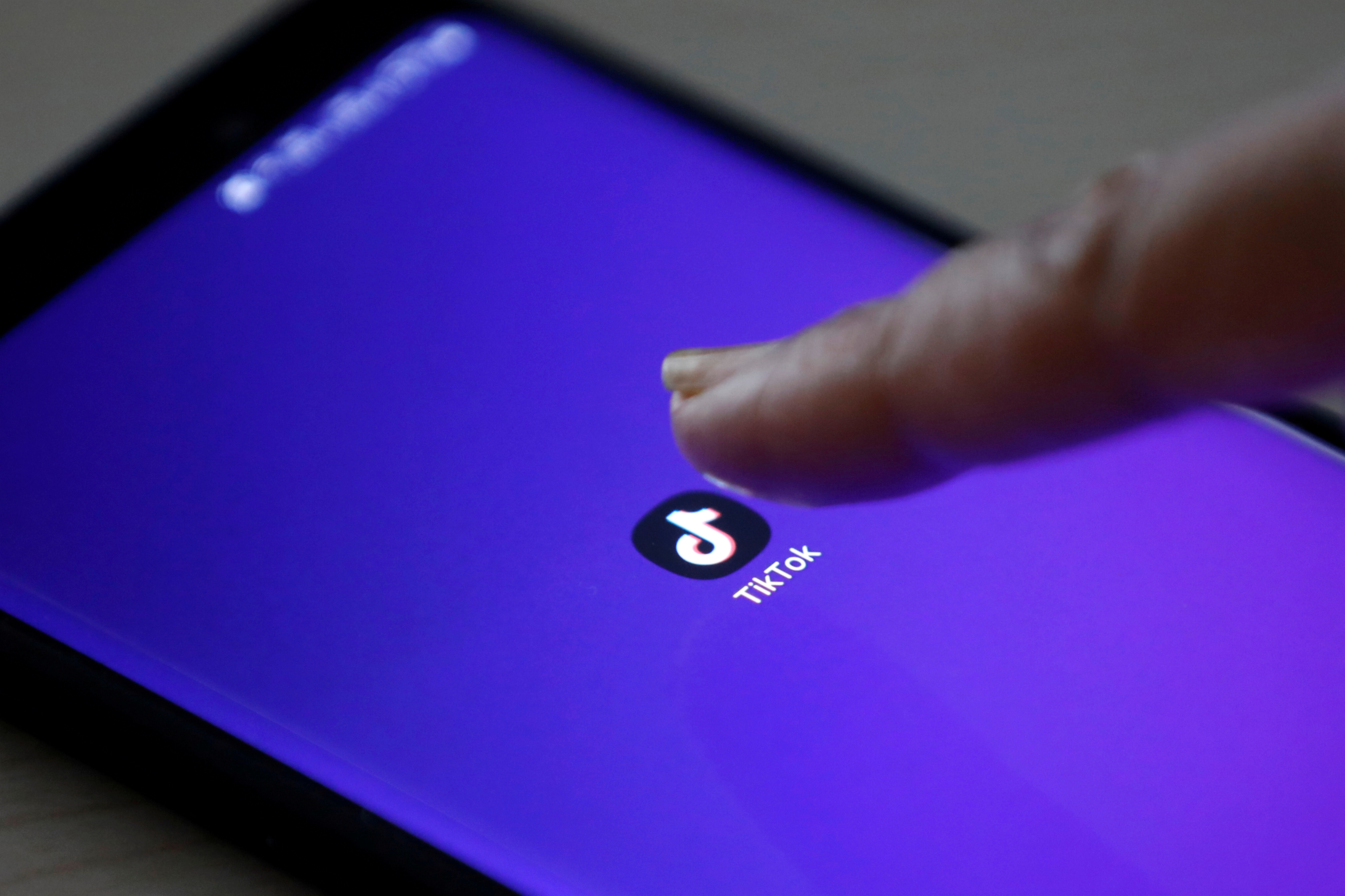 The logo of TikTok application is seen on a mobile phone screen in this picture illustration taken February 21, 2019. Photo: Reuters
