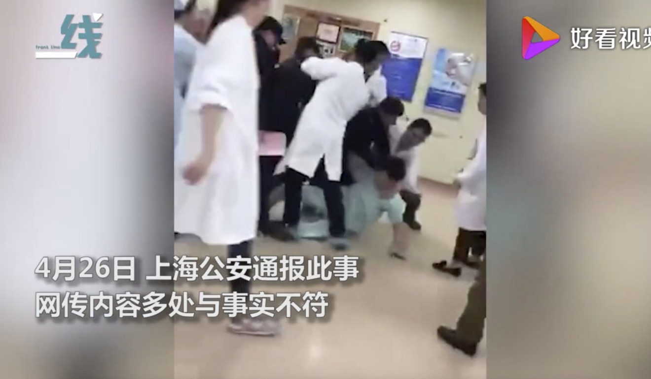 The 48-year-old doctor suffered bruises to his arms and neck in the scuffle. Photo: Weibo
