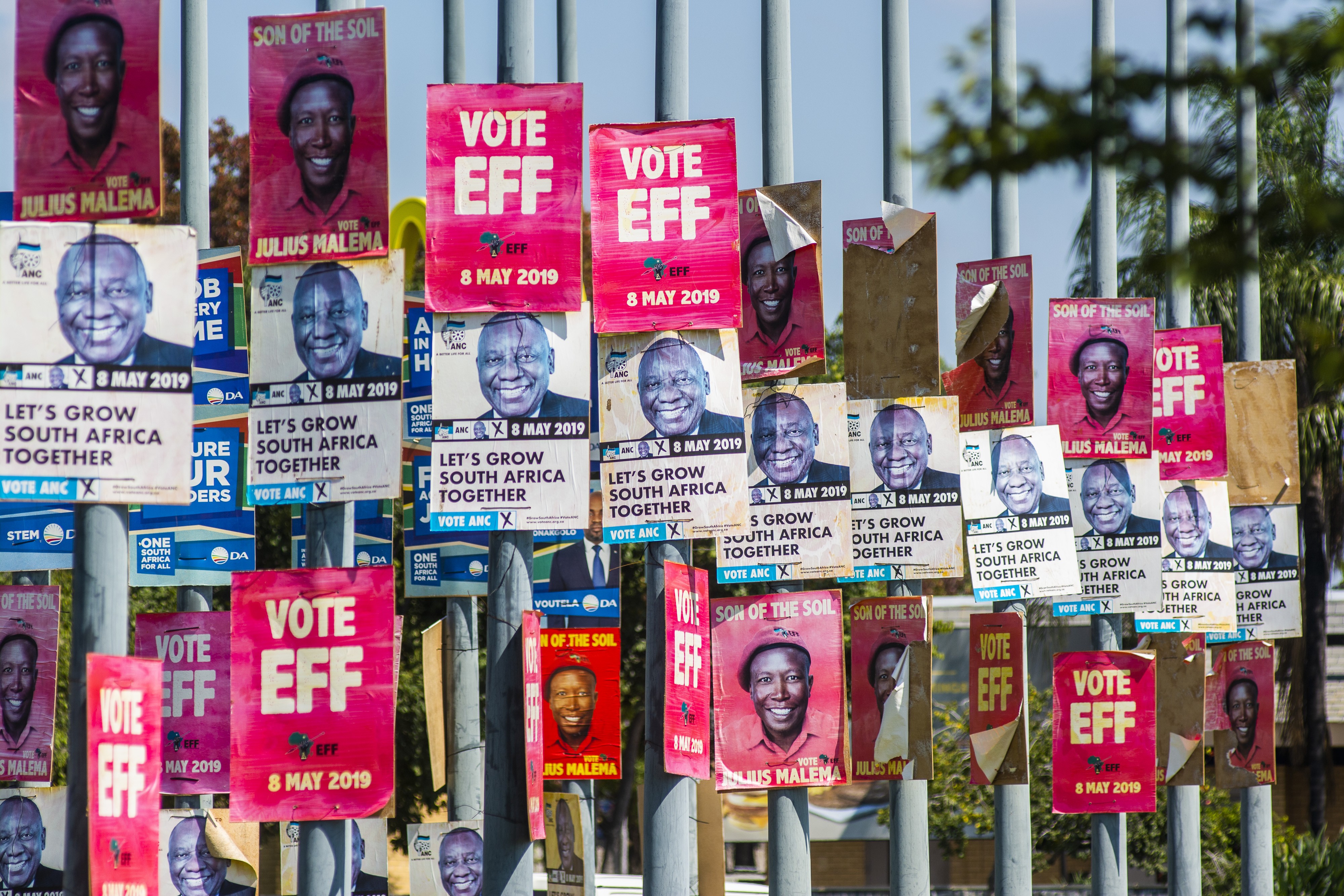 Election posters for President Cyril Ramaphosa and Julius Malema, leader of the Economic Freedom Fighters on a road side in Pretoria. Photo: Bloomberg