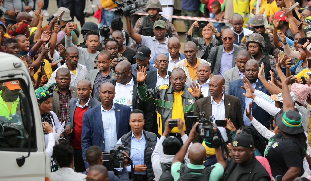 Ramaphosa greets residents of Alexandra township at a rally. Photo: Reuters