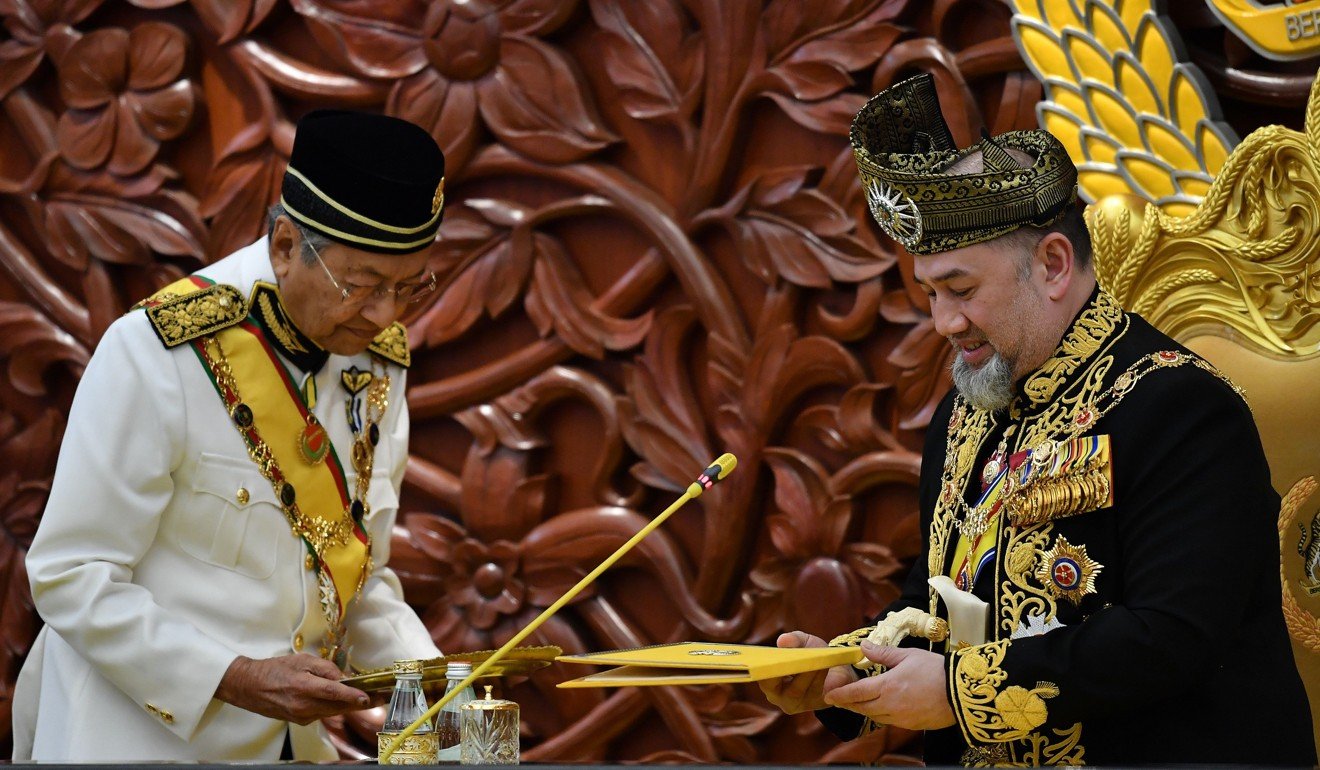Mahathir with Sultan Muhammad V (right), the 15th king of Malaysia. Photo: AFP