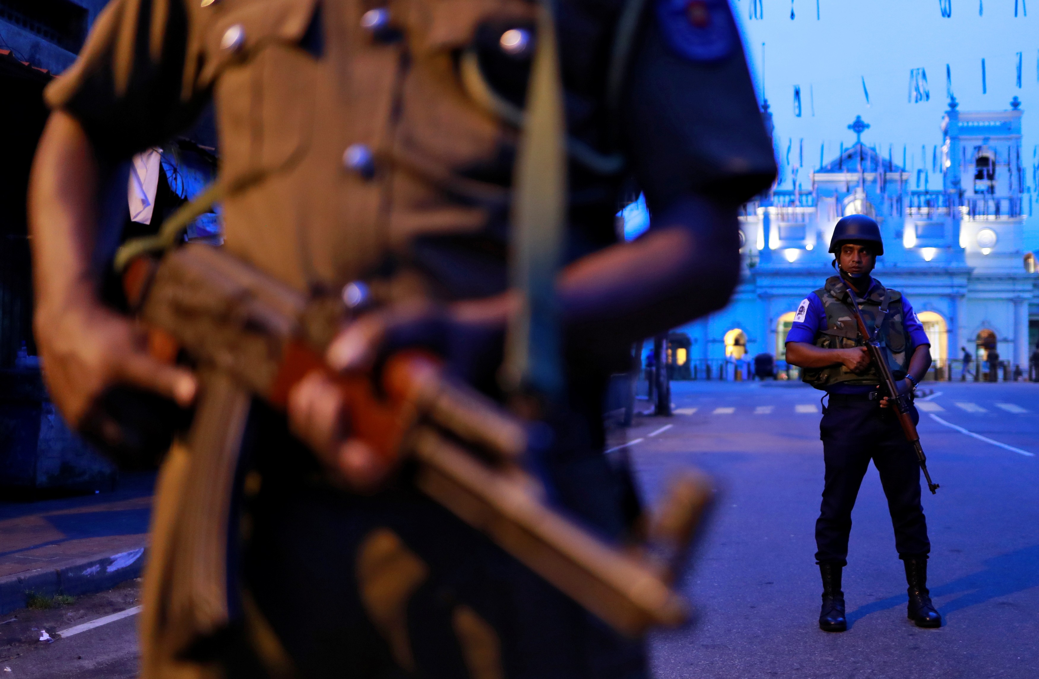 Security personnel stand guard in front of St Anthony’s Shrine in Colombo. Photo: Reuters