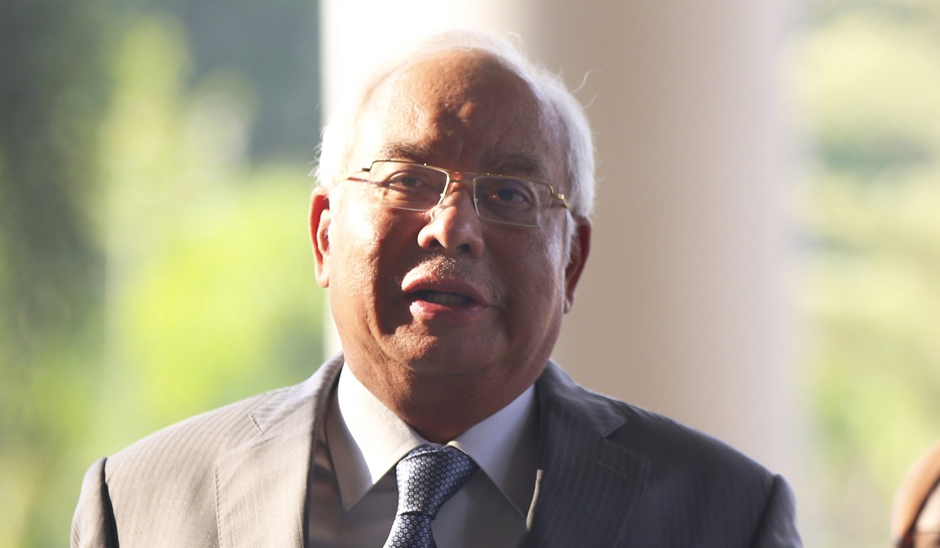 Former Malaysian Prime Minister Najib Razak arrives at court for a corruption trial. Photo: AP