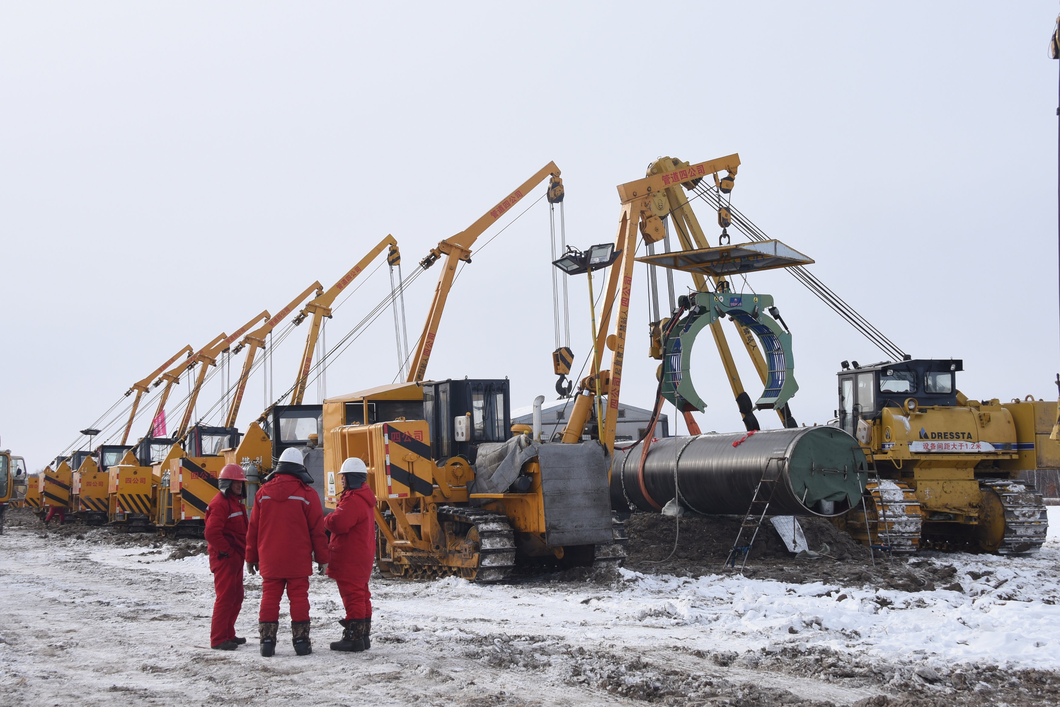 Workers of China National Petroleum Corporation (CNPC) at a construction site for laying natural gas pipelines connecting China and Russia, in Heihe prefecture of Heilongjiang province on China’s border with Russia on January 25, 2018. Photo: China Daily via REUTERS