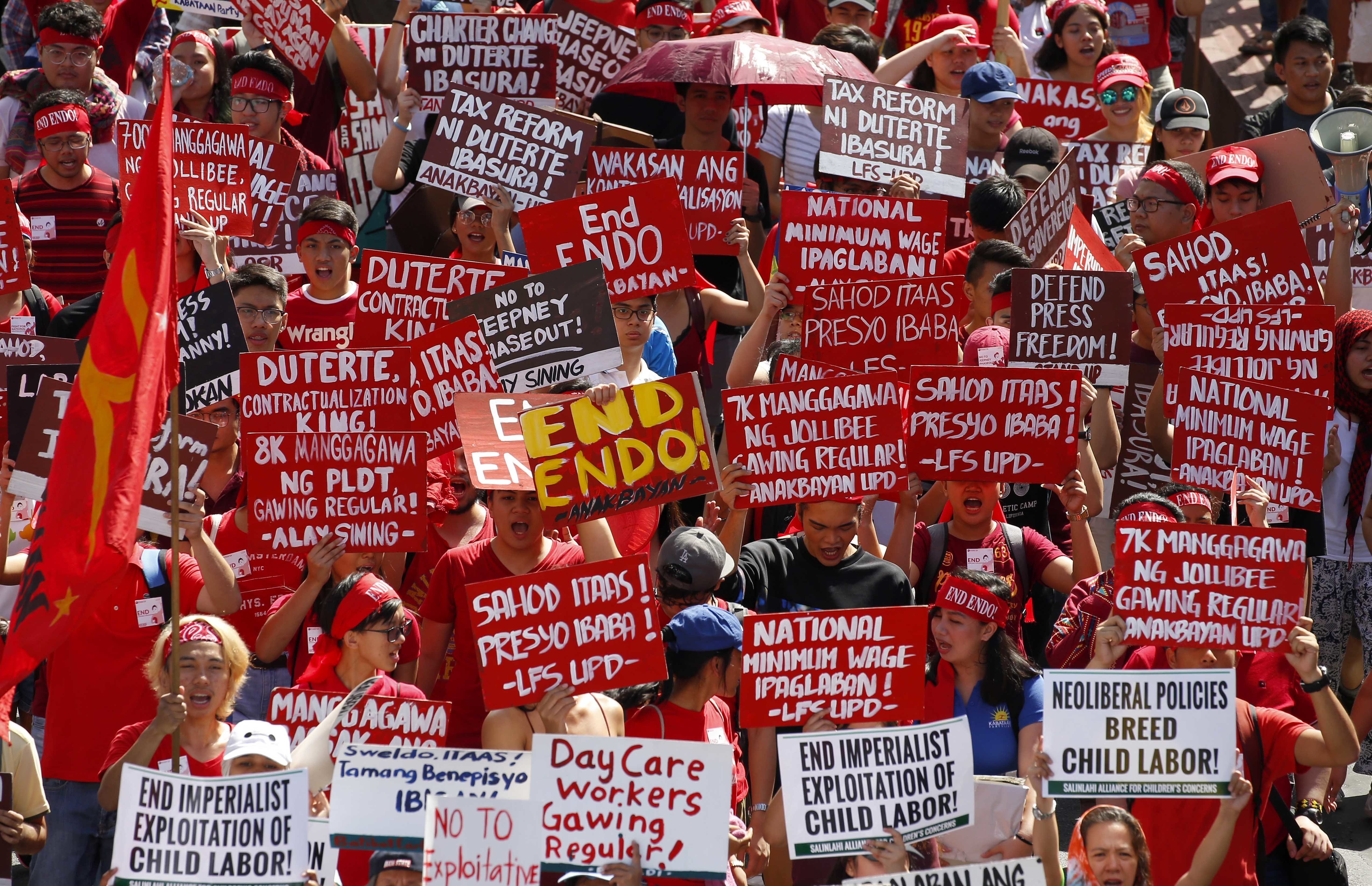 Protesters at last year’s Labour Day march in Manila. Photo: AP