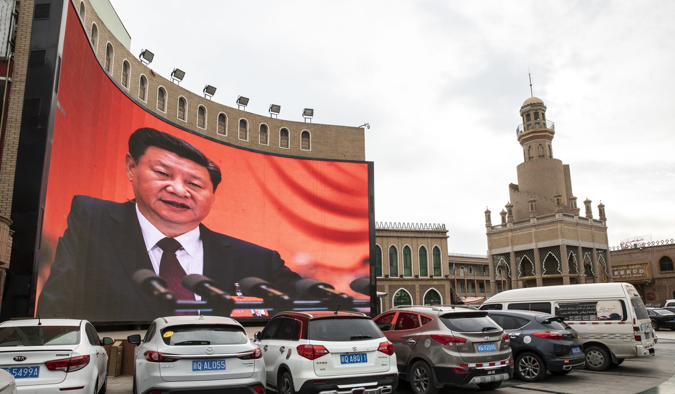 An image of Chinese President Xi Jinping in Xinjiang, where government surveillance is becoming increasingly sophisticated. Photo: Bloomberg