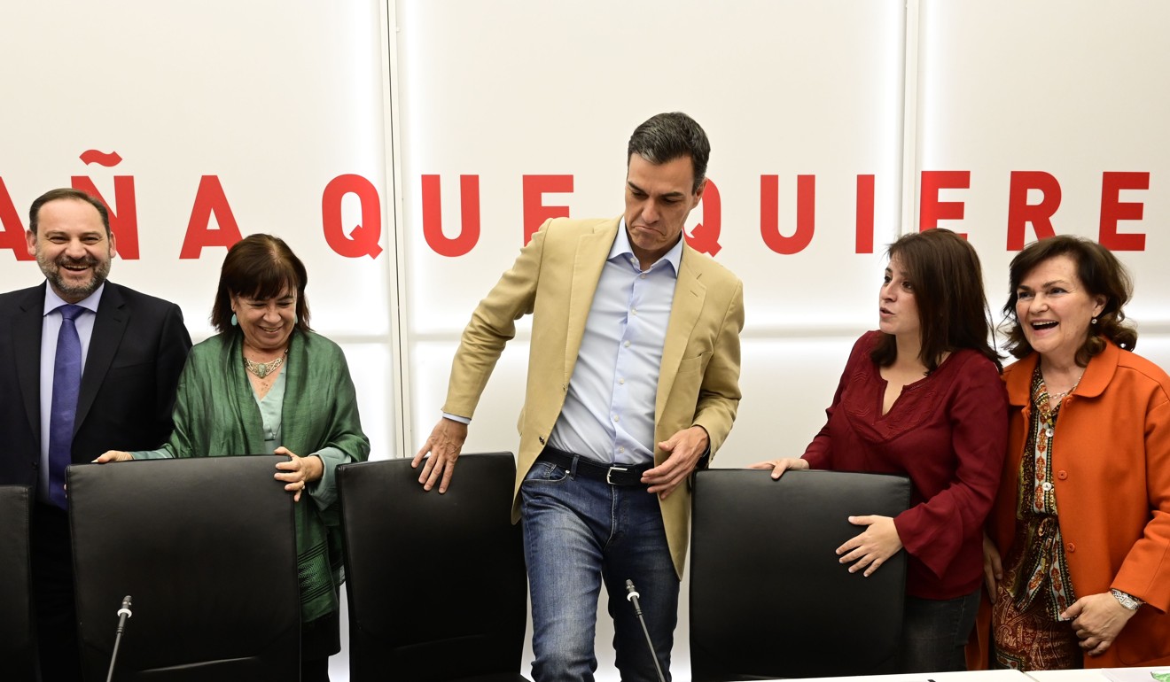 Spanish Prime Minister Pedro Sanchez (centre) takes his seat between other party members during a Spanish Socialist Workers' Party meeting in Madrid on April 29, the day after the party prevailed in general elections, though not by enough for an outright majority. Photo: AFP