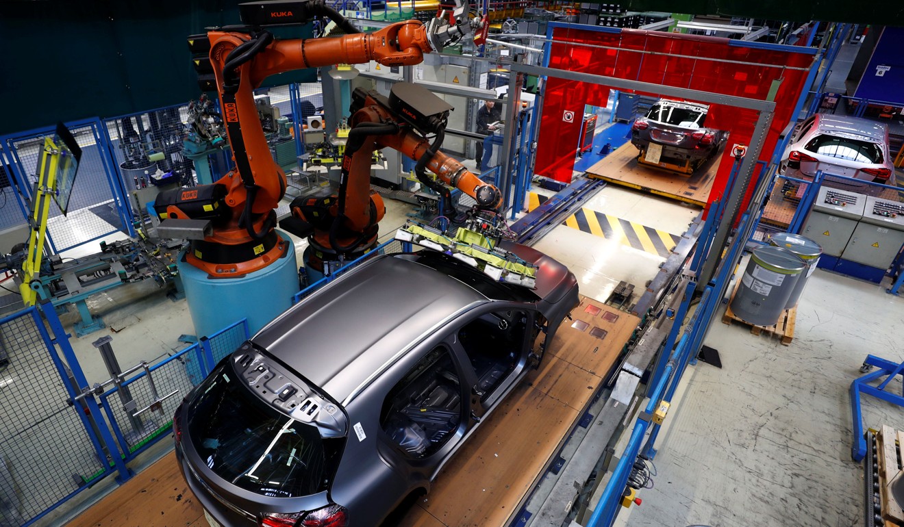 A robot installs a windscreen on a Mercedes Benz auto on the production line at the Daimler factory in Rastatt, Germany, on February 4. Automation is expected to eliminate many jobs in the next decade and a half, although McKinsey & Company has argued that other high-skilled jobs will be created. Photo: Reuters