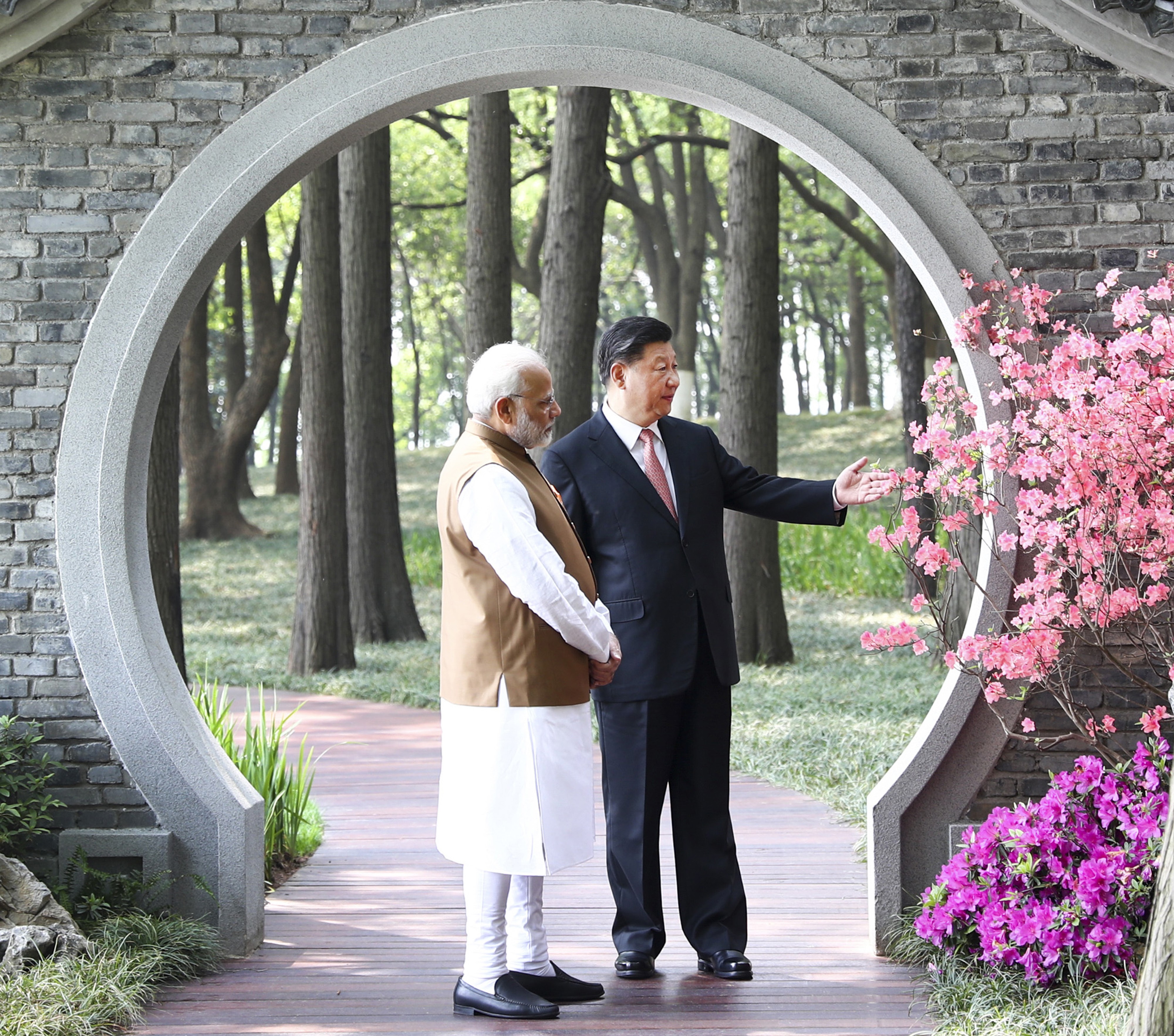 Indian Prime Minister Narendra Modi, left, and Chinese President Xi Jinping talk in Wuhan in April last year. Photo: Xinhua