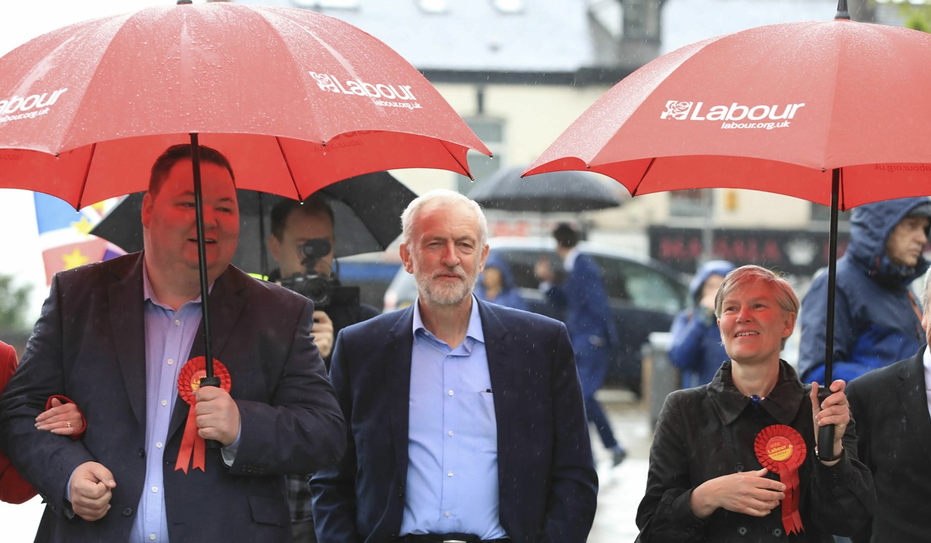 Labour Party leader Jeremy Corbyn, centre, arrives Friday May 3, 2019 to celebrate the election result for Trafford Council. Photo: PA via AP