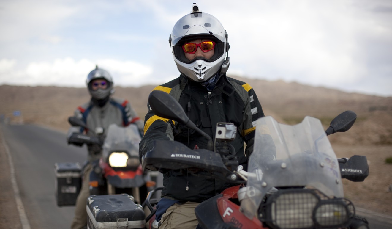 Ryan Pyle and Colin Pyle cruise on their motorcycles through Gansu province, China, while filming Tough Rides: China.