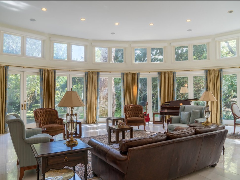 High ceilings and hardwood floors give the home an elegant look. Photo: Keller Williams/ Beverly Hills