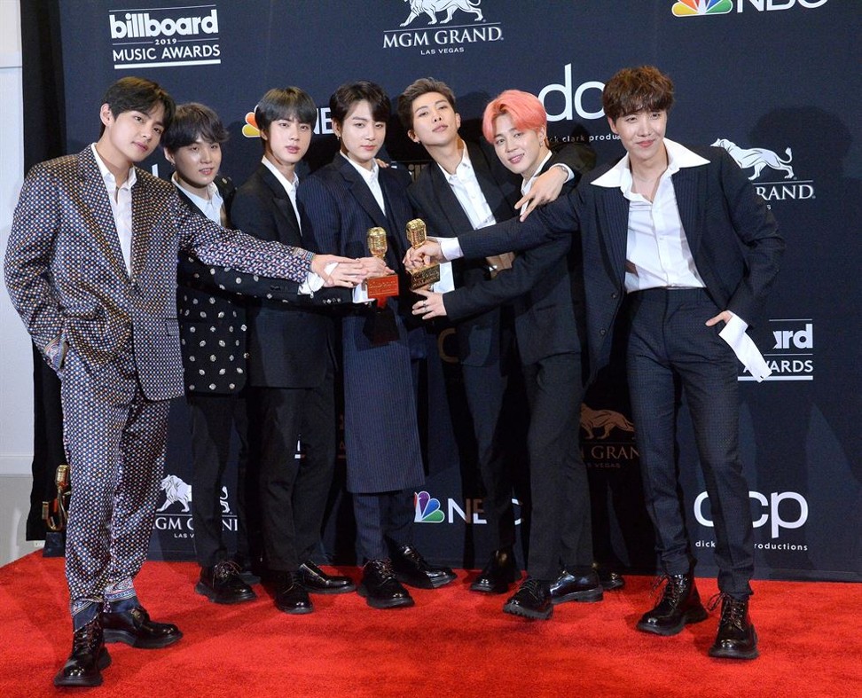 BTS (from left) J-Hope, V, Jungkook, Jimin, Suga, Jin, and RM celebrate backstage after winning the top duo/group and top social artist awards at Wednesday’s 2019 Billboard Music Awards. Photo: UPI-Yonhap