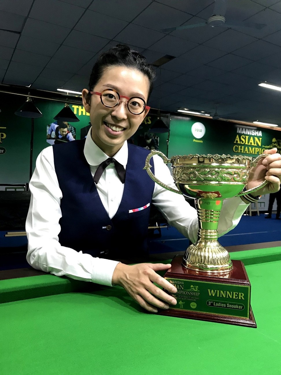 Ng On-yee with her trophy after winning the Asian title. Photo: HKBSCC