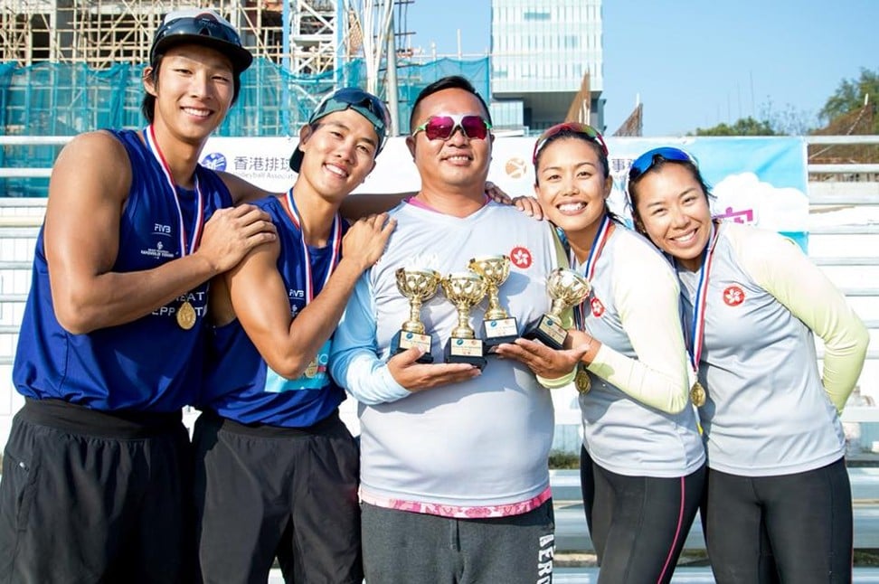 Lau (second left) and Wong (left) with teammates – and trophies – after a game.