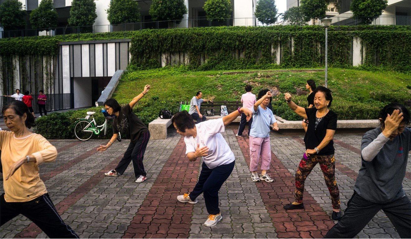 Singaporeans practise tai chi at a HDB estate in Tanjong Pagar. Photo: Bloomberg