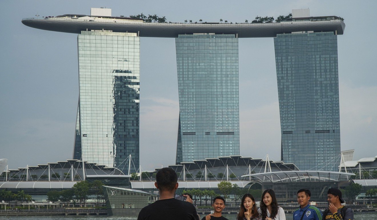 Most of Singapore’s reclaimed land has been put to non-residential use such as the financial district at Marina Bay. Photo: Roy Issa