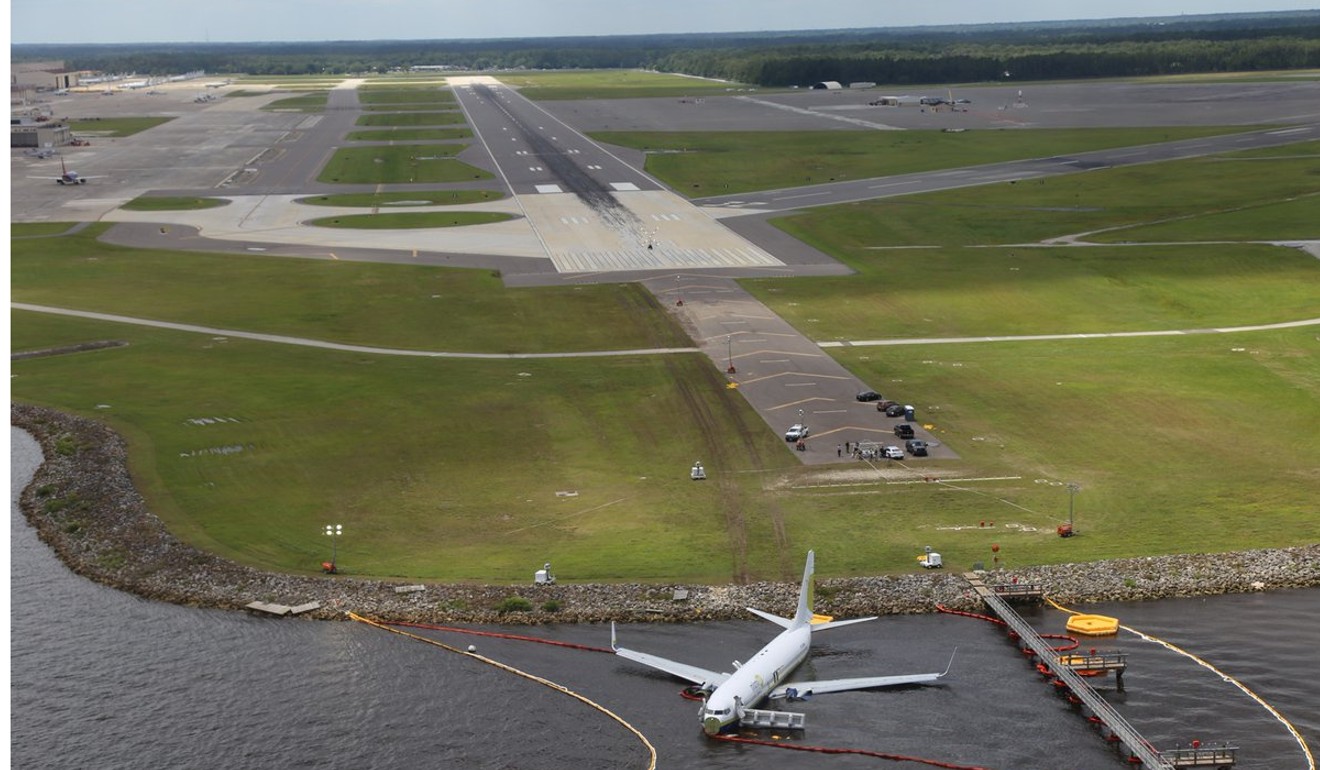 The Miami Air International Boeing 737-800 in St Johns River in Jacksonville, Florida on Saturday. Photo: Reuters
