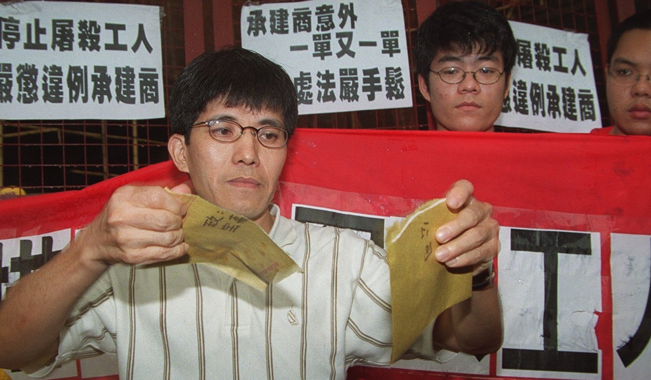 Chan Kam-hong tears a petition letter during a protest after the fatal collapse of a concrete beam at the KMB depot in Lai Chi Kok in May 2001.