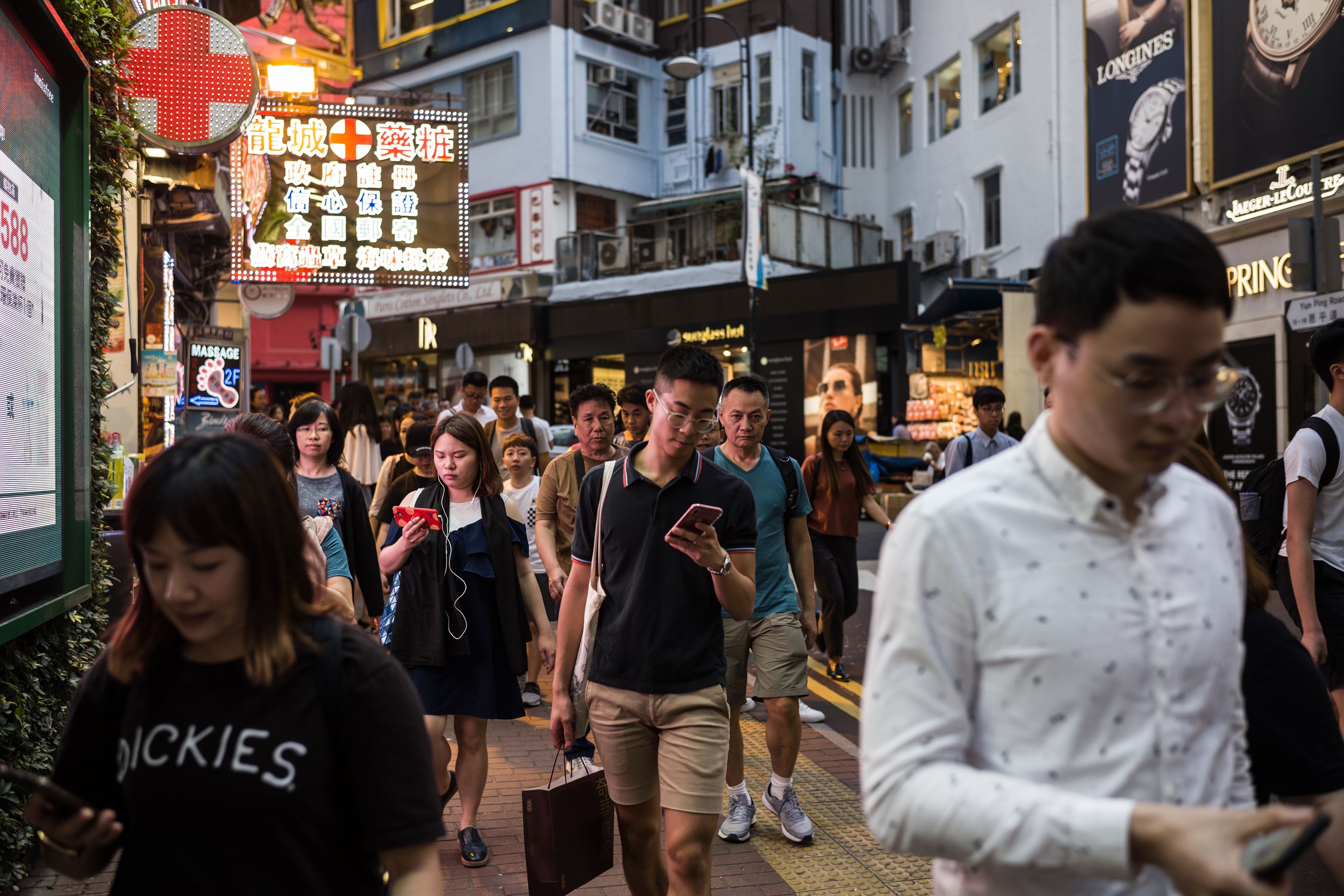 The amount of innovation underway makes long term forecasting problematic, especially when it comes to the future needs for urban space, writes Nicholas Brooke. Pedestrians in the popular shopping district of Causeway Bay in Hong Kong. Photo: AFP