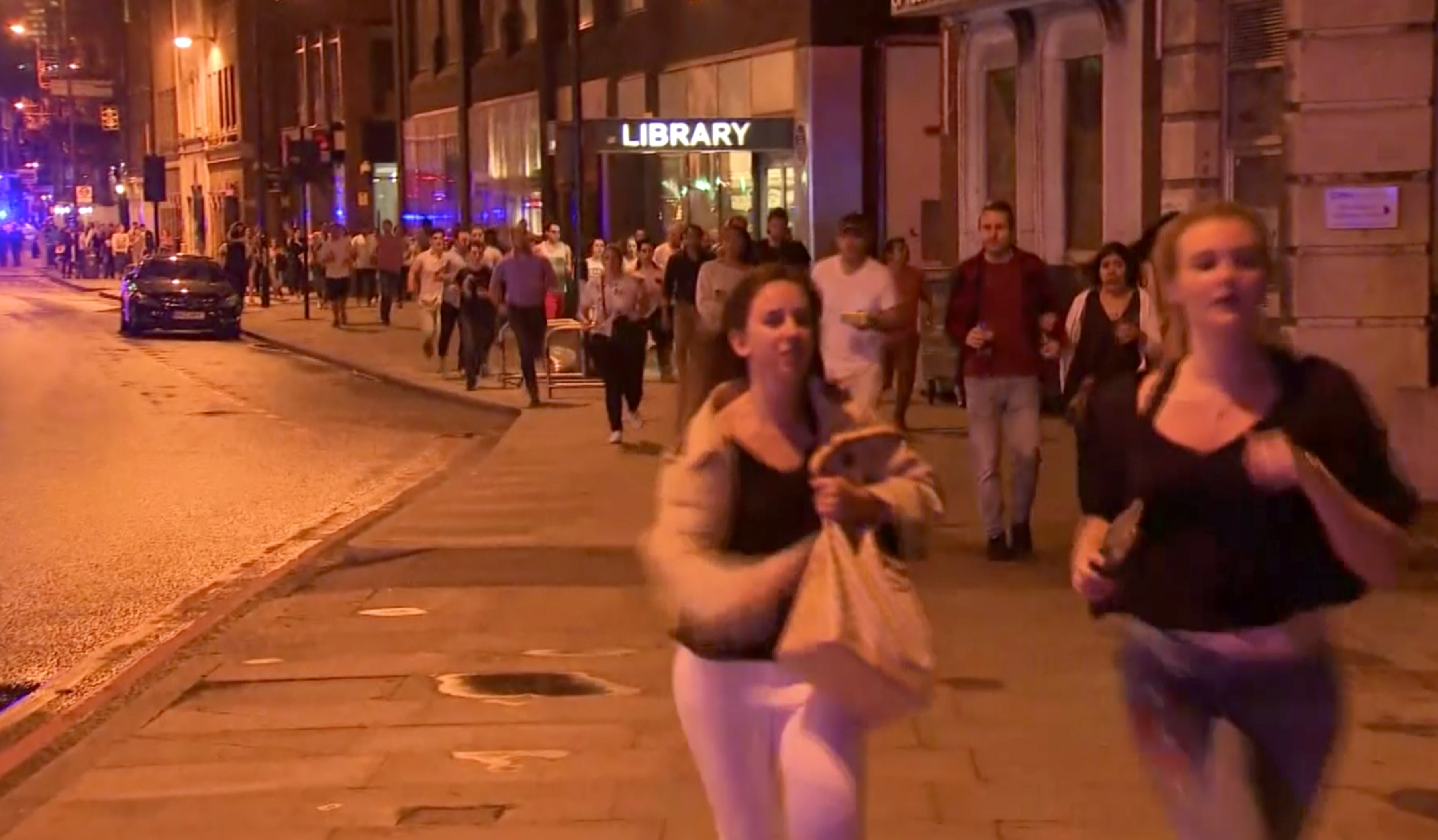 A still of a video showing people running from the scene of the attack in London on June 3, 2017. Photo: AP