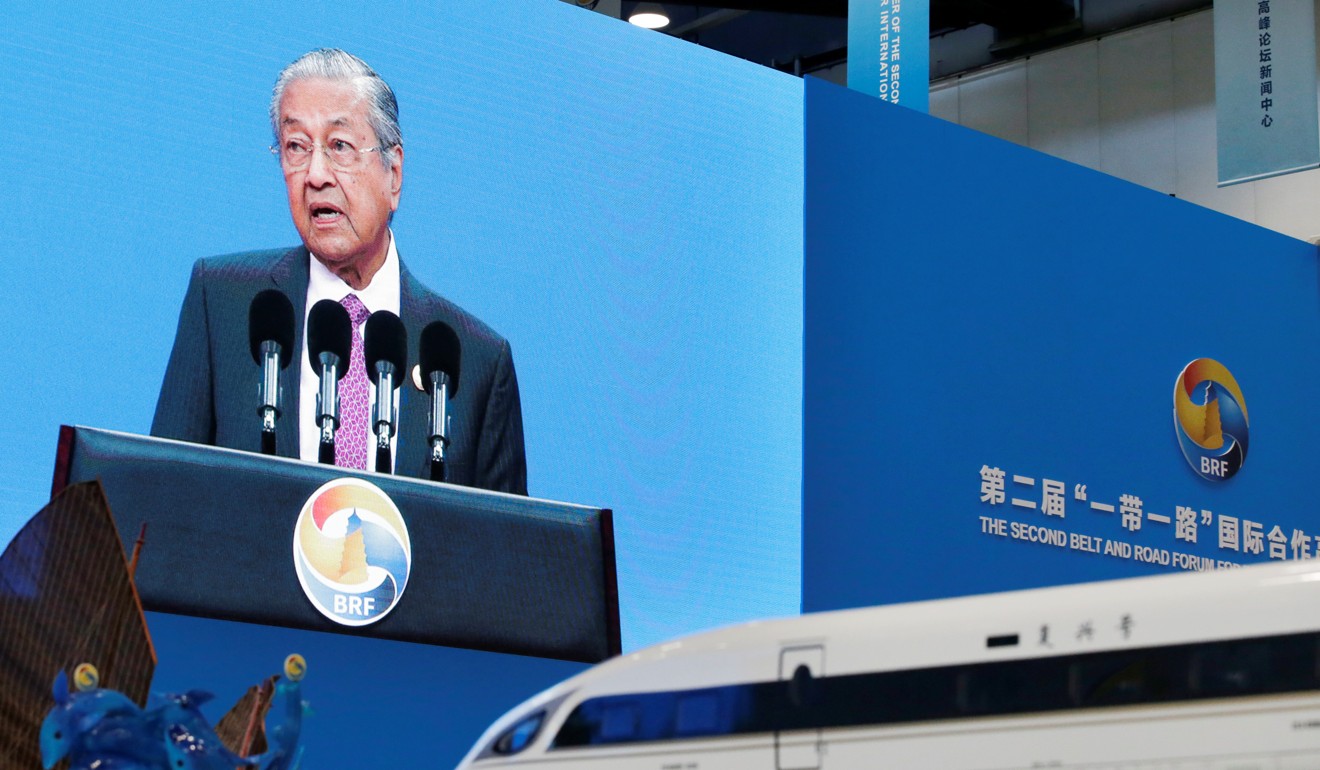 Malaysian Prime Minister Mahathir Mohamad delivering a speech at the opening ceremony of the second Belt and Road Forum in Beijing, next to a replica of China Railway high-speed train. Photo: Reuters