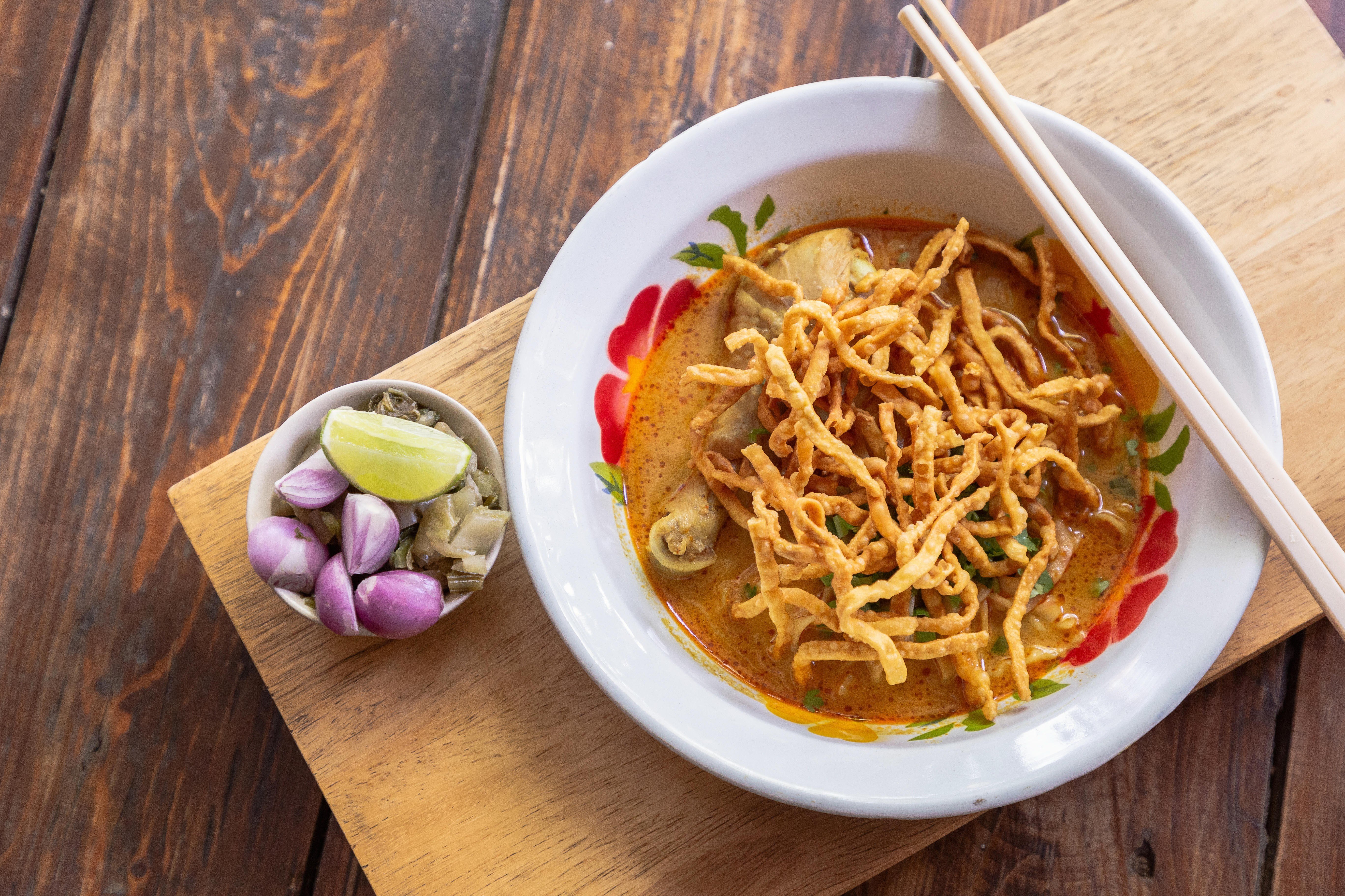 Curried noodle soup with chicken meat and spicy coconut milk is popular in Chiang Mai. Photo: Alamy