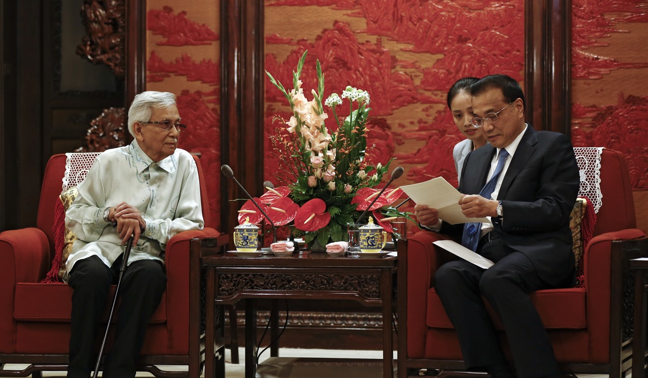 Daim Zainuddin with Chinese Premier Li Keqiang in Beijing last year. Photo: AP