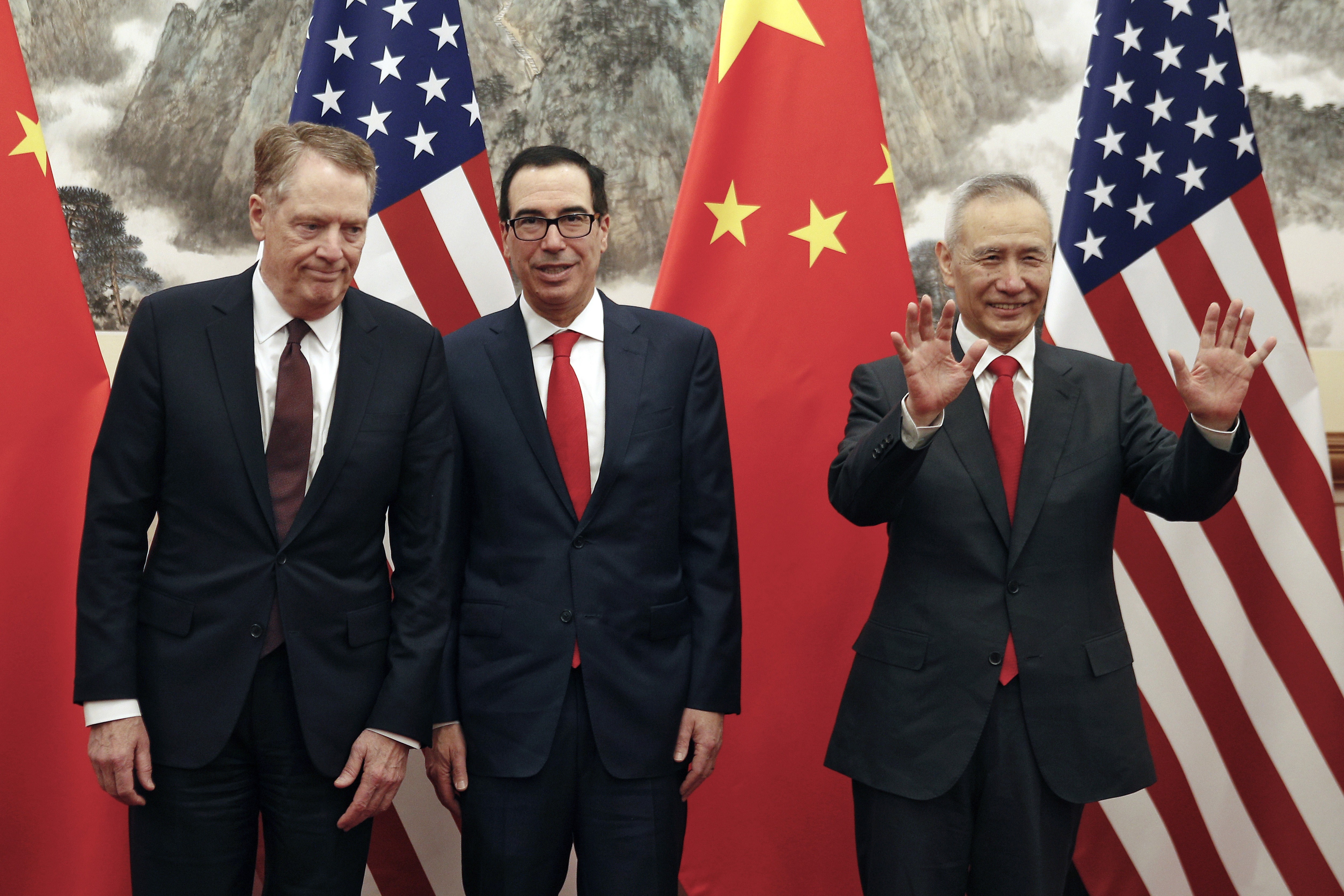 Chinese Vice-Premier Liu He (right) gestures as US Treasury Secretary Steven Mnuchin (centre) chats with Trade Representative Robert Lighthizer before their meeting at the Diaoyutai State Guesthouse in Beijing on May 1. President Donald Trump has turned up the pressure on China, threatening to hike tariffs on US$200 billion worth of Chinese goods. Photo: AP