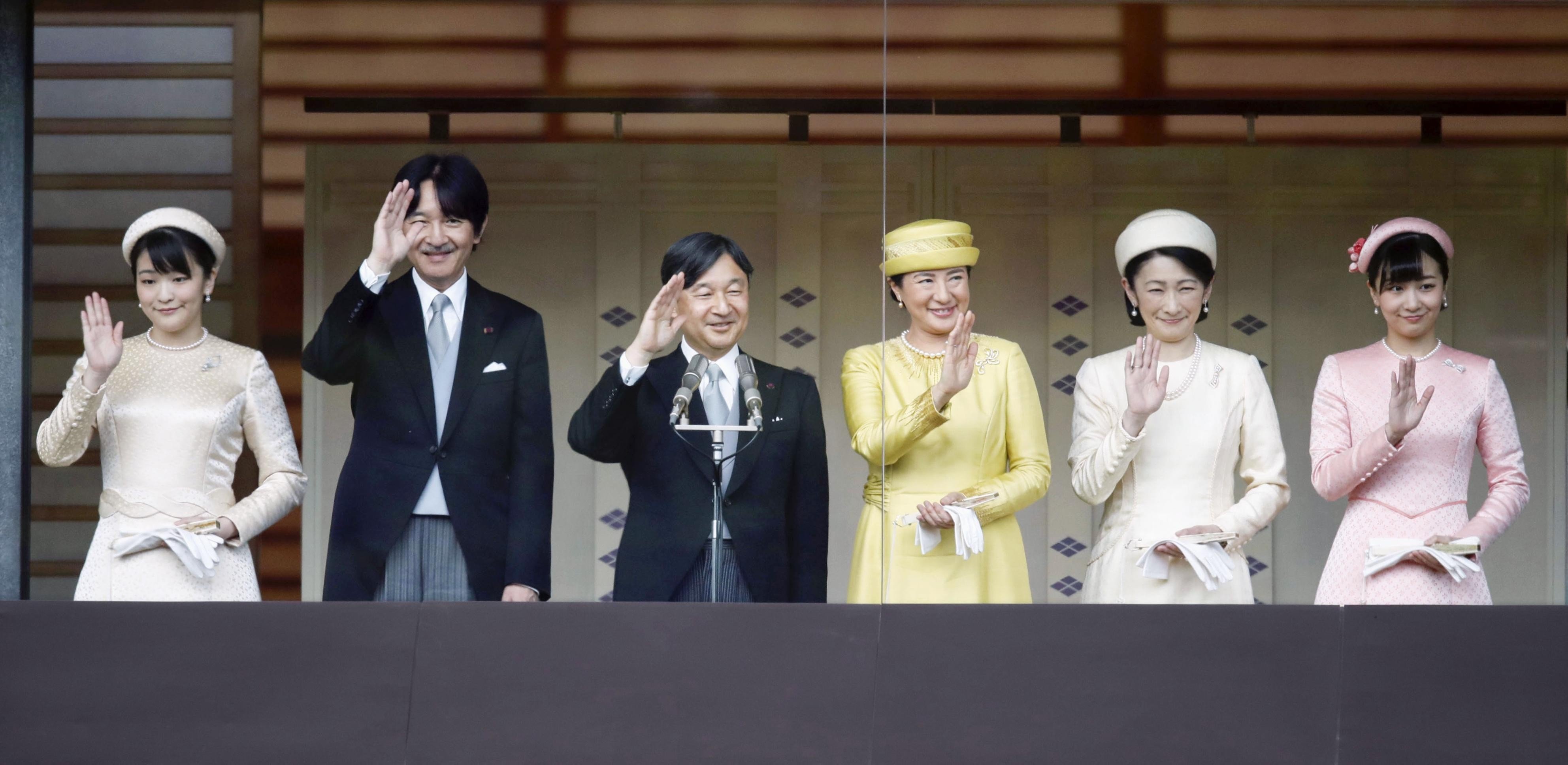 Japan’s Emperor Naruhito (second left), Empress Masako (second right), Crown Prince Fumihito (left) and Crown Princess Kiko (right) wave to well-wishers gathered at the Imperial Palace in Tokyo on May 4. It was the emperor's first public appearance since his enthronement on May 1. Photo: Kyodo