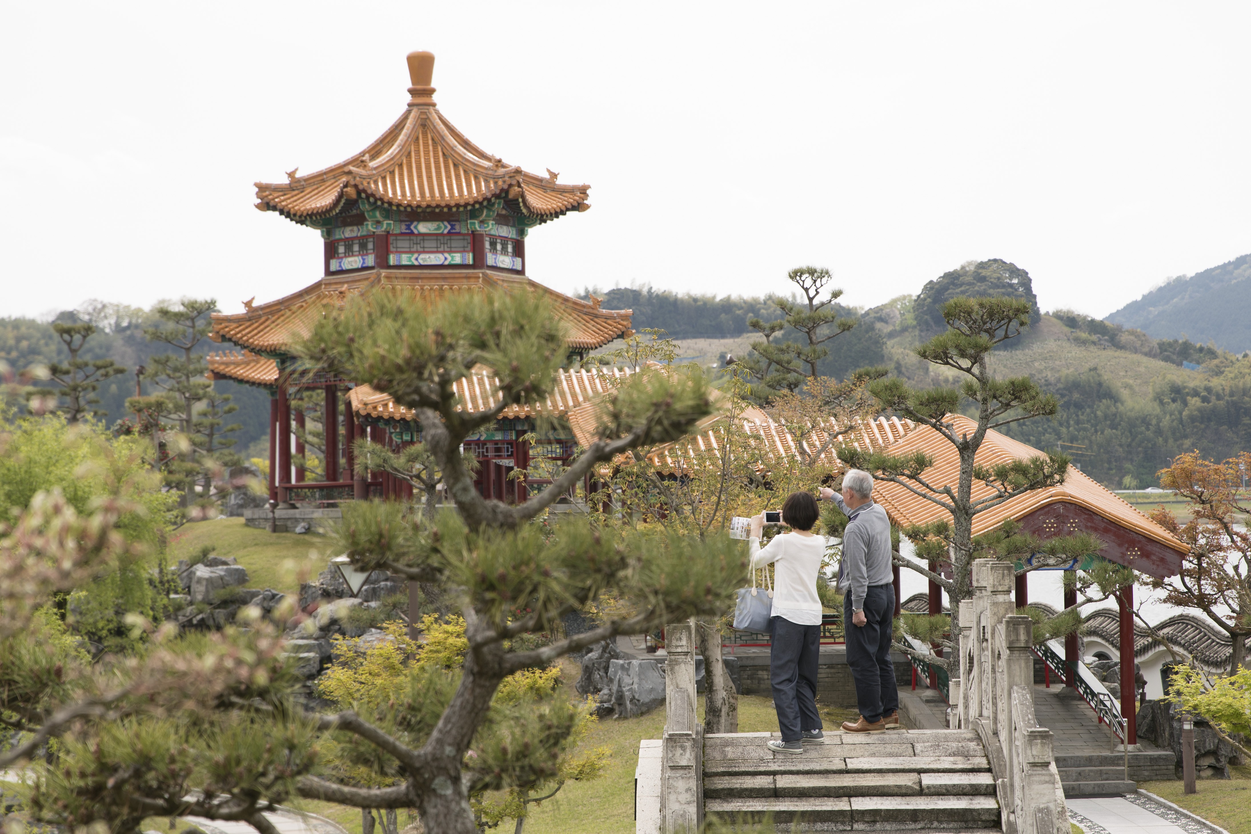 Tourists visit the Encho-en garden in Tottori, Japan, one of the biggest Chinese-style gardens in Japan, on April 18. Covering about 10,000 square metres, Encho-en was built in 1995 as a sign of friendship between Tottori and north China’s Hebei province. Photo: Xinhua