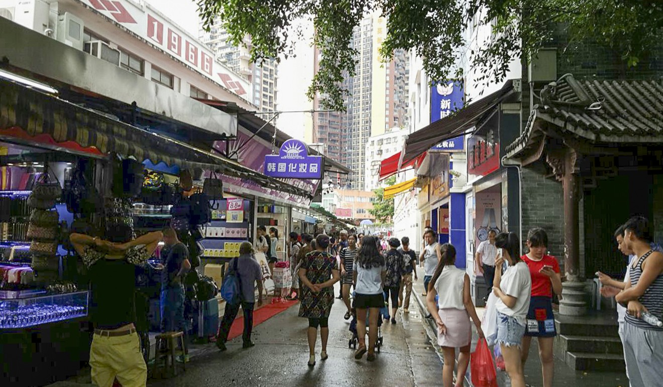 Chung Ying Street, with the Hong Kong on the left and mainland China on the right. Photo: Tom Tsang