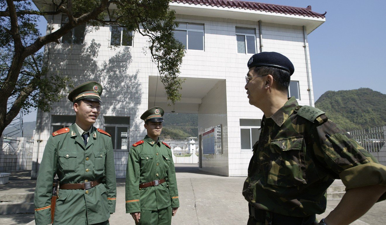 Officers from both sides meet at a border farm in Sha Tau Kok in 2004. Photo: Dickson Lee