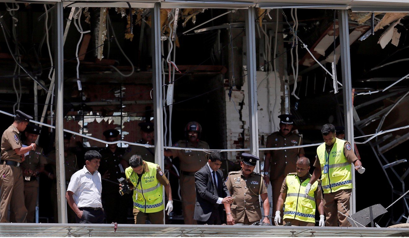 Officials inspect the site of an explosion at Shangri-La hotel in Colombo on April 21. Photo: Reuters