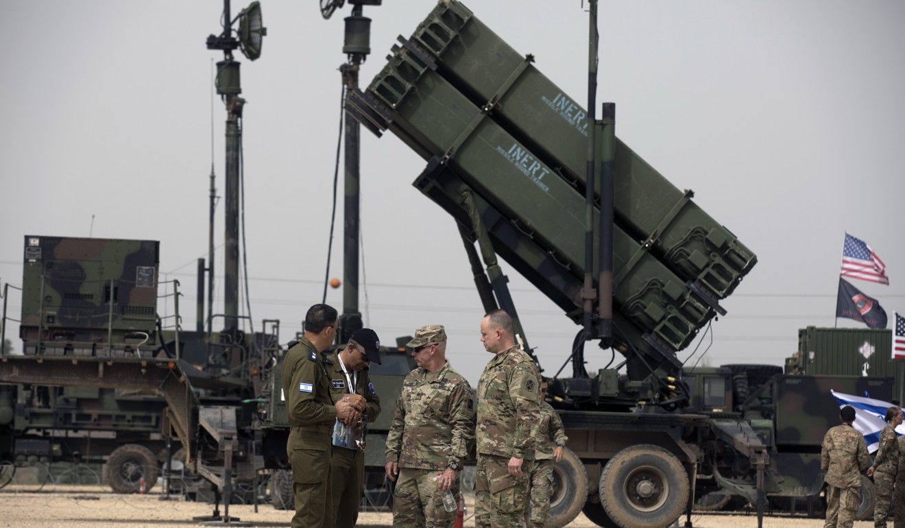 US Air Force and Israeli Air force personnel next to a Patriot missile defense system at the Israeli Air Force Base of Hatzor. Photo: EPA-EFE