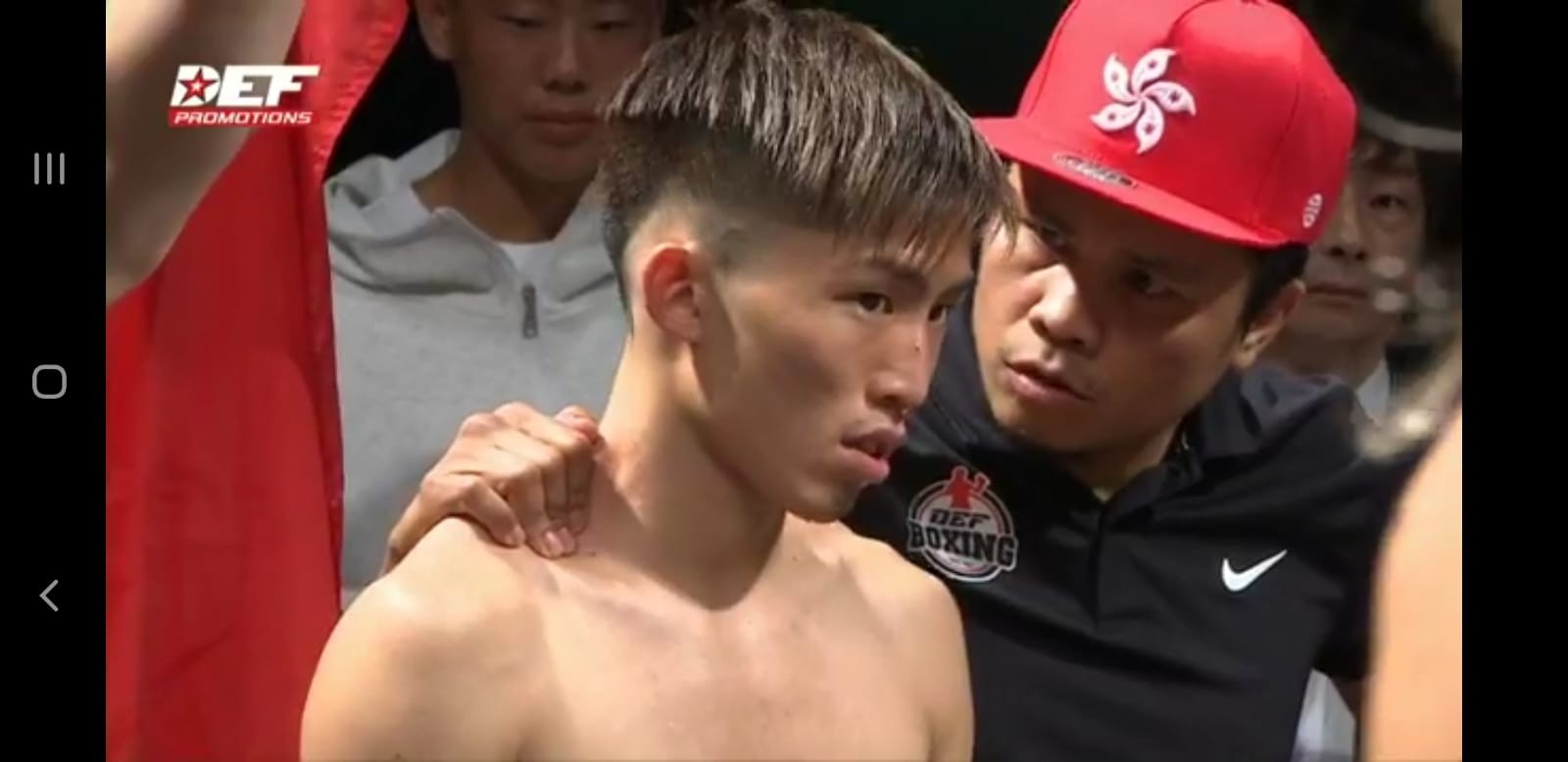 Raymond Poon and trainer Jake Verano moments before their WBO world youth title fight at the Convention and Exhibition Centre. Photo: DEF Boxing