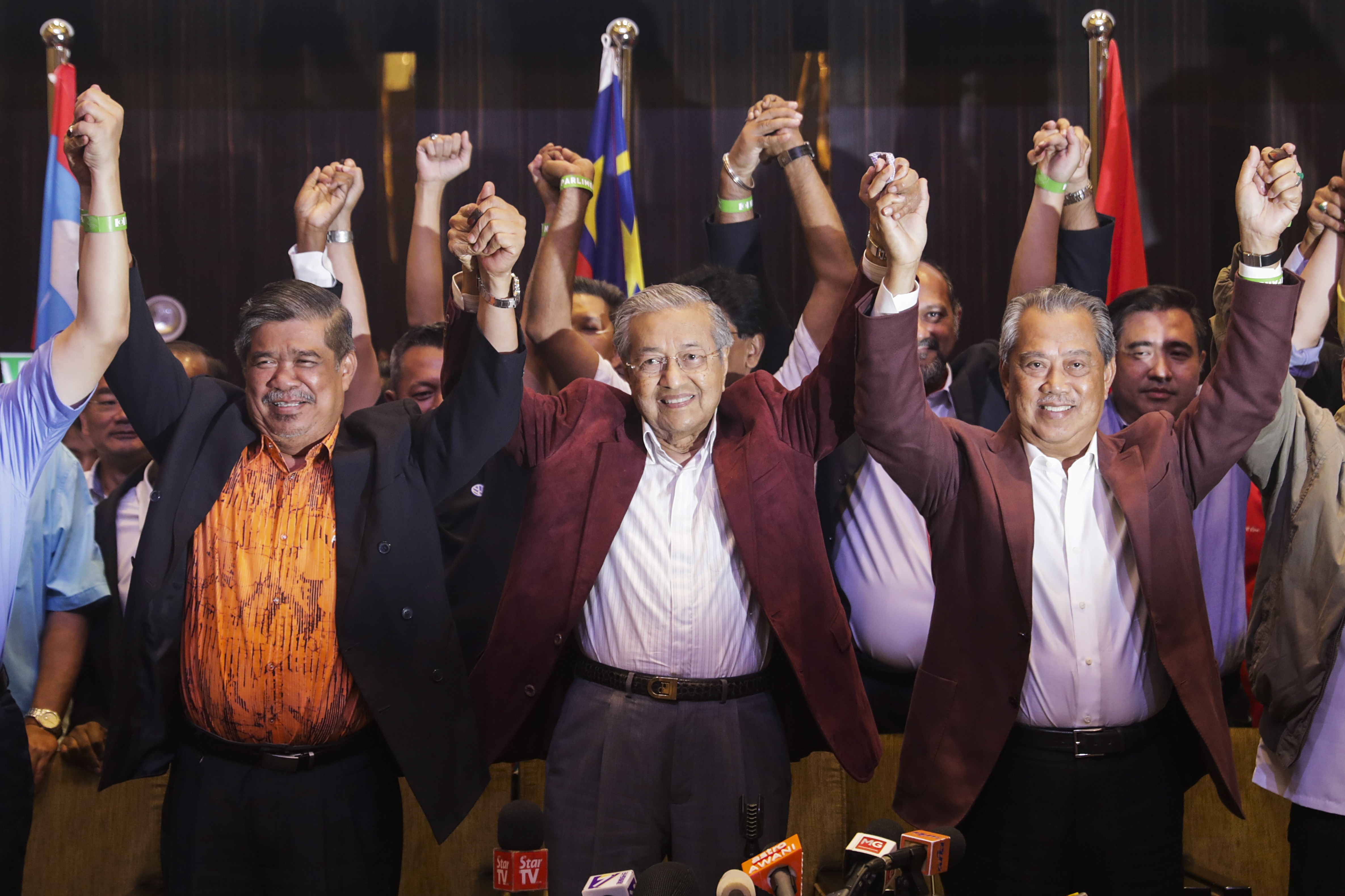 Malaysian Prime Minister Mahathir Mohamad (centre) and other members of Pakatan Harapan celebrate after last year’s elections. Photo: EPA