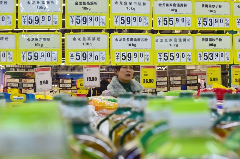 A customer shops at a supermarket in Handan, Hebei province. Photo: Reuters