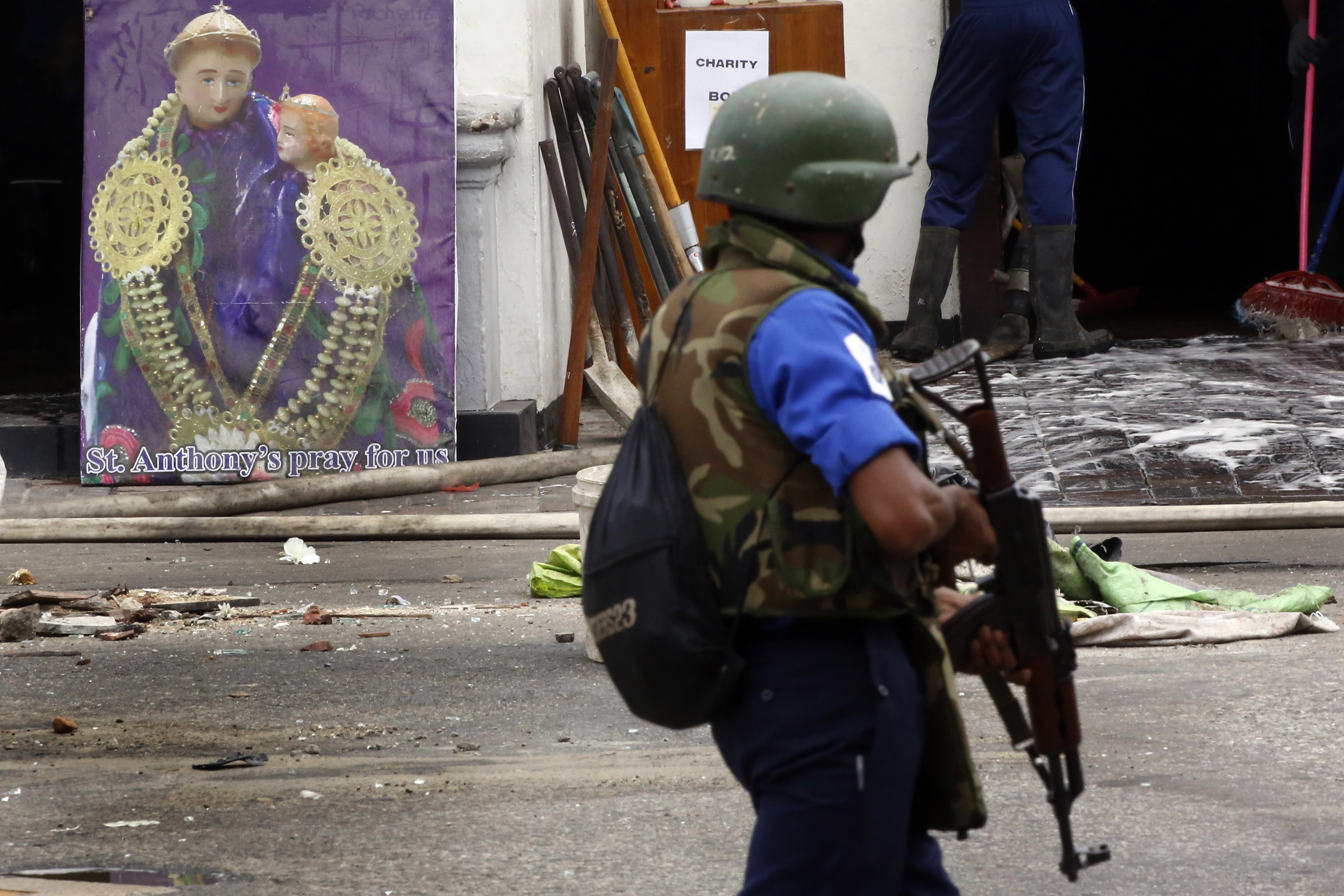 Security personnel patrol outside St Anthony’s Church, one of the sites bombed on Easter Sunday. Photo: EPA