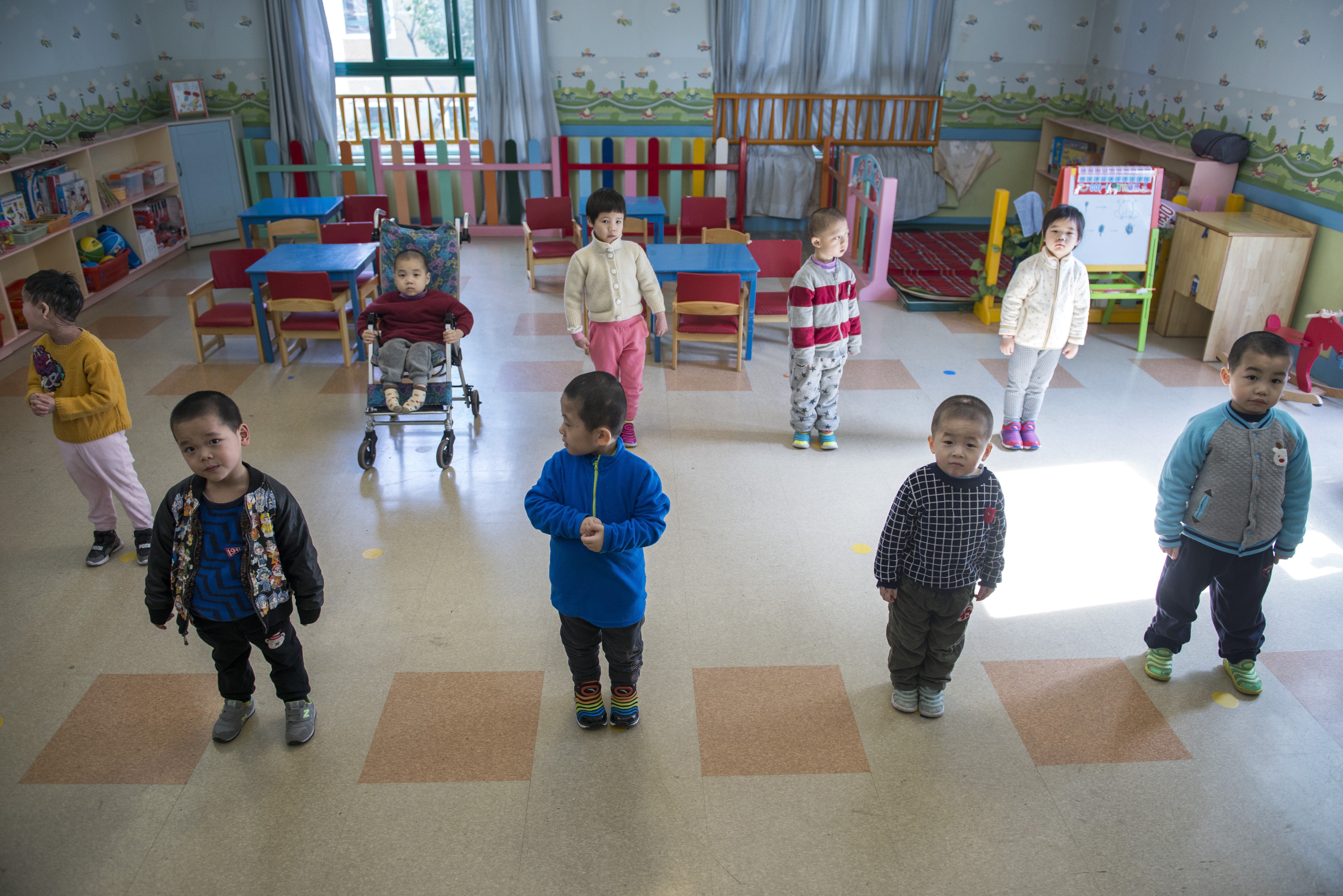Children with disabilities at the Shanghai Children's Home orphanageWelfare Institute, in China. Photo: Zigor Aldama
