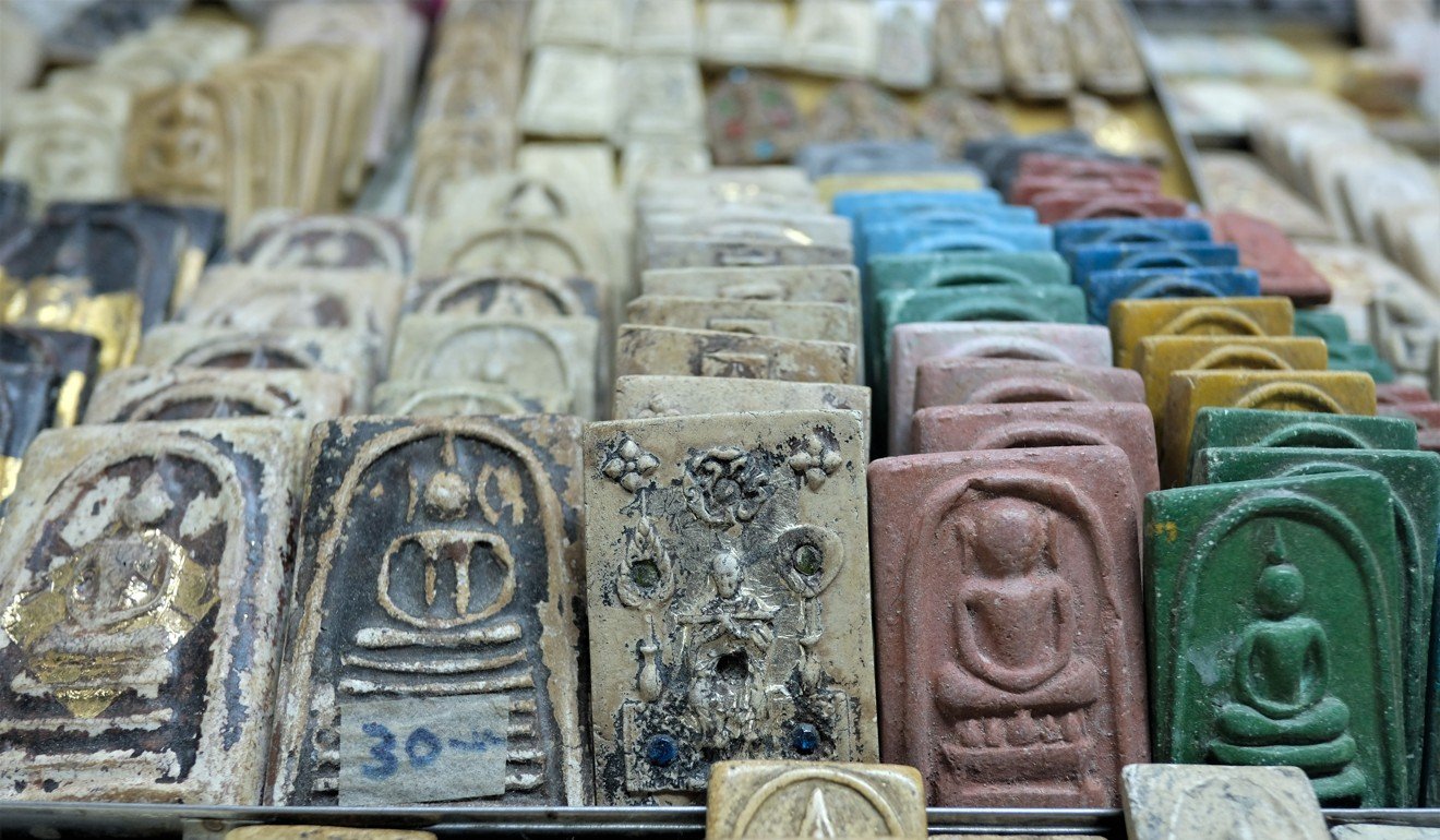 Buddhist amulets for sale at a price of 30 baht (US$1). “Ultimately an amulet sells for what someone is willing to pay for it,” says a dealer. Photo: Tibor Krausz