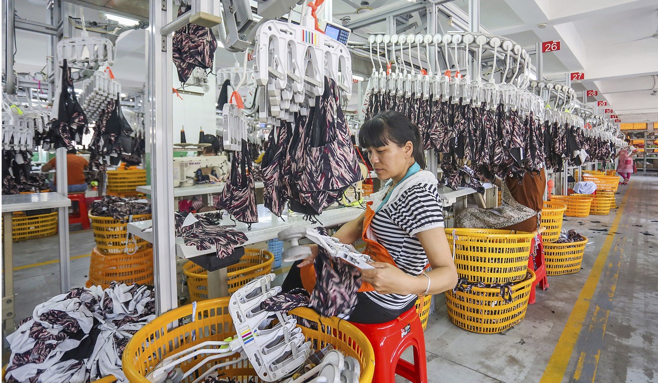 Politburo Standing Committee member Wang Yang said that in the worst case scenario the trade war would cut a percentage point off China’s GDP growth. Photo: AP