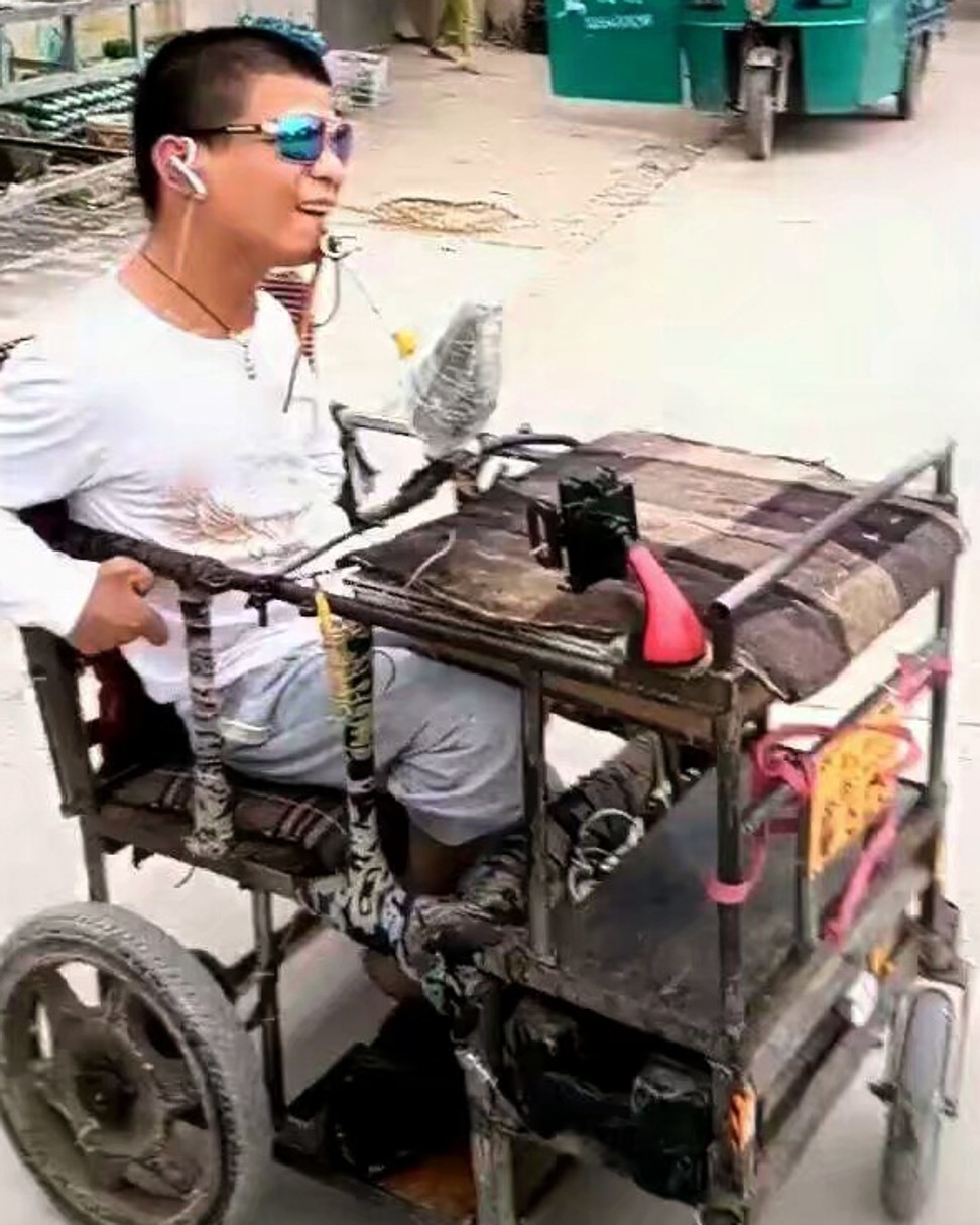 Gao Guangli is confined to a wheelchair and can only move his mouth, but with his adventurous spirit and origami skills he wanted to see the big cities of China. Photo: Gao Guangli