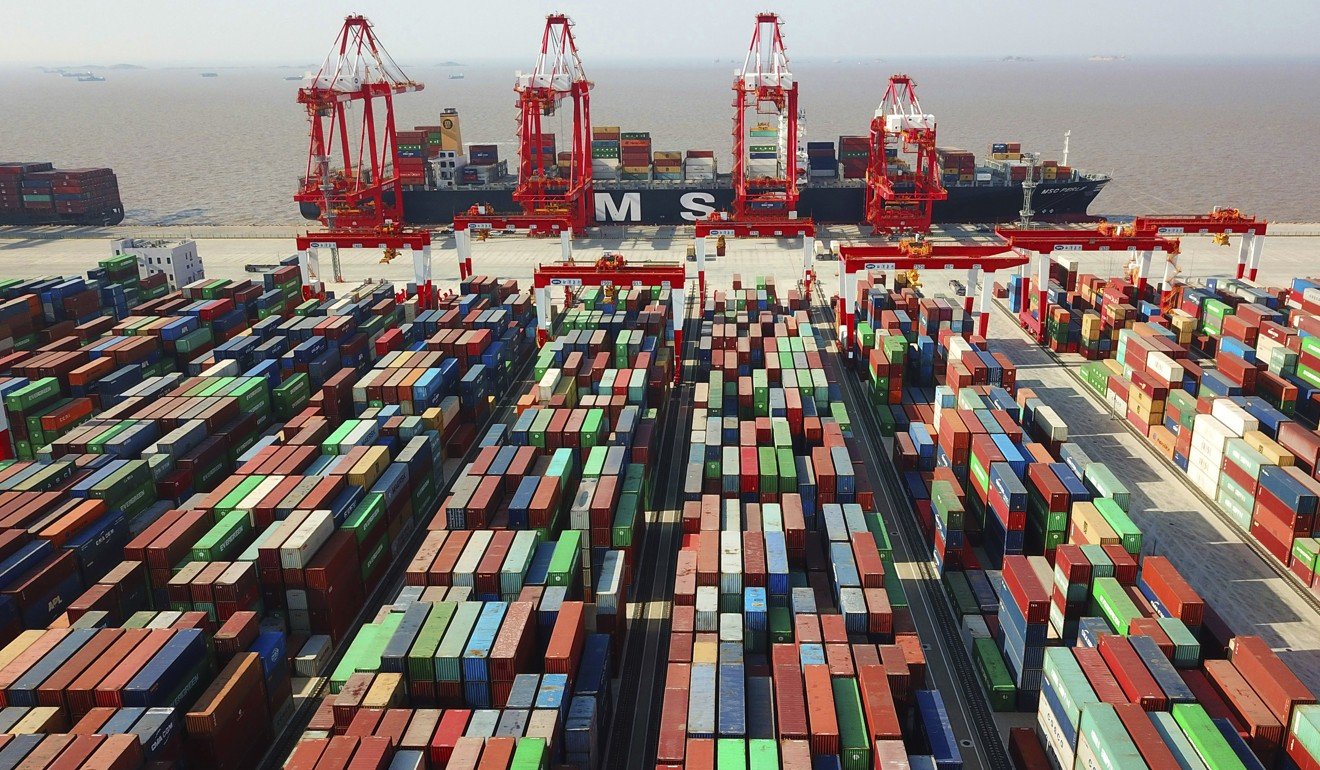 A cargo ship is seen docked at the Yangshan container port in Shanghai. Photo: AP