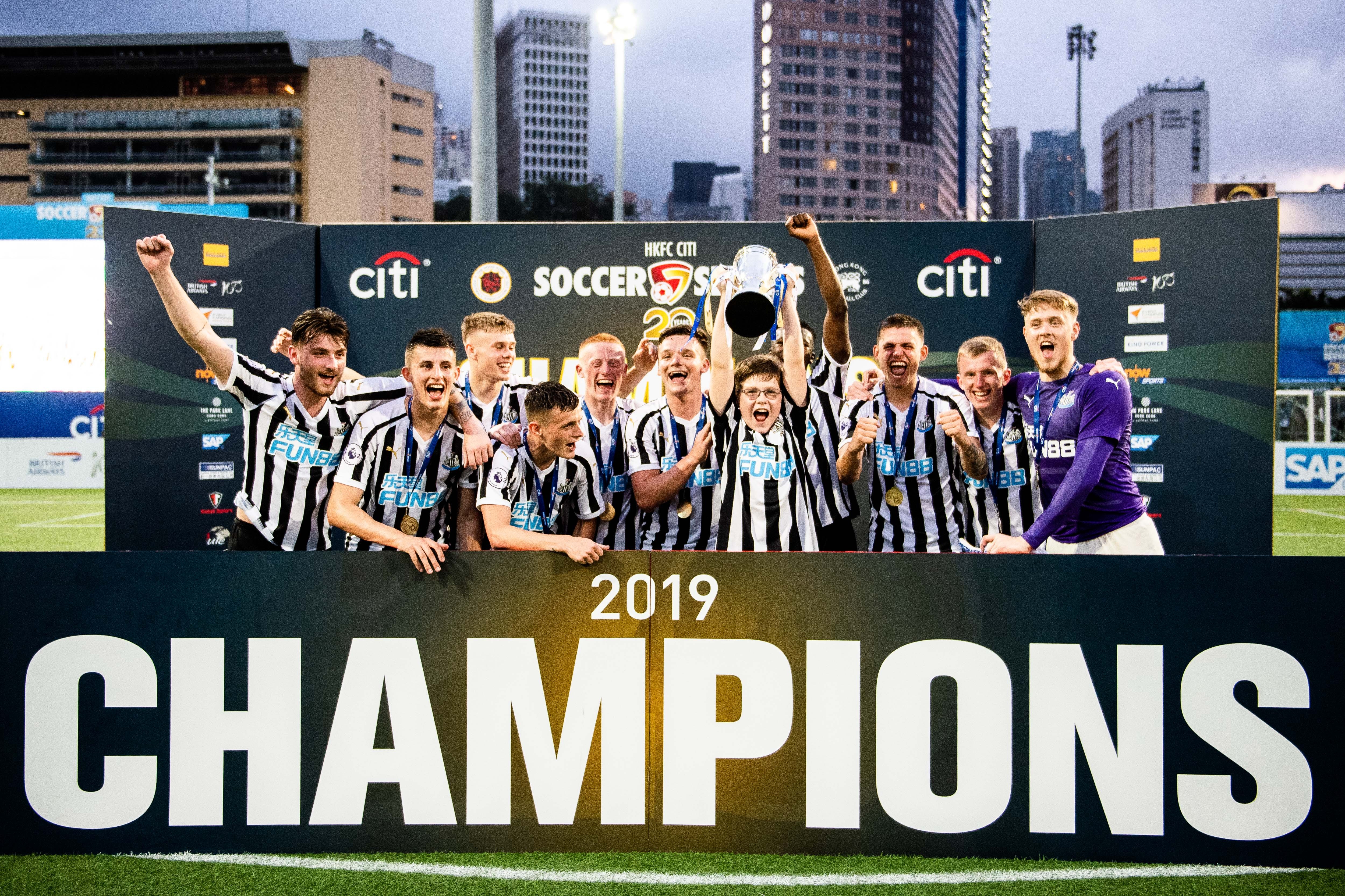 Newcastle United celebrate retaining the Main Cup at the HKFC Citi Soccer Sevens. Photo: Handout