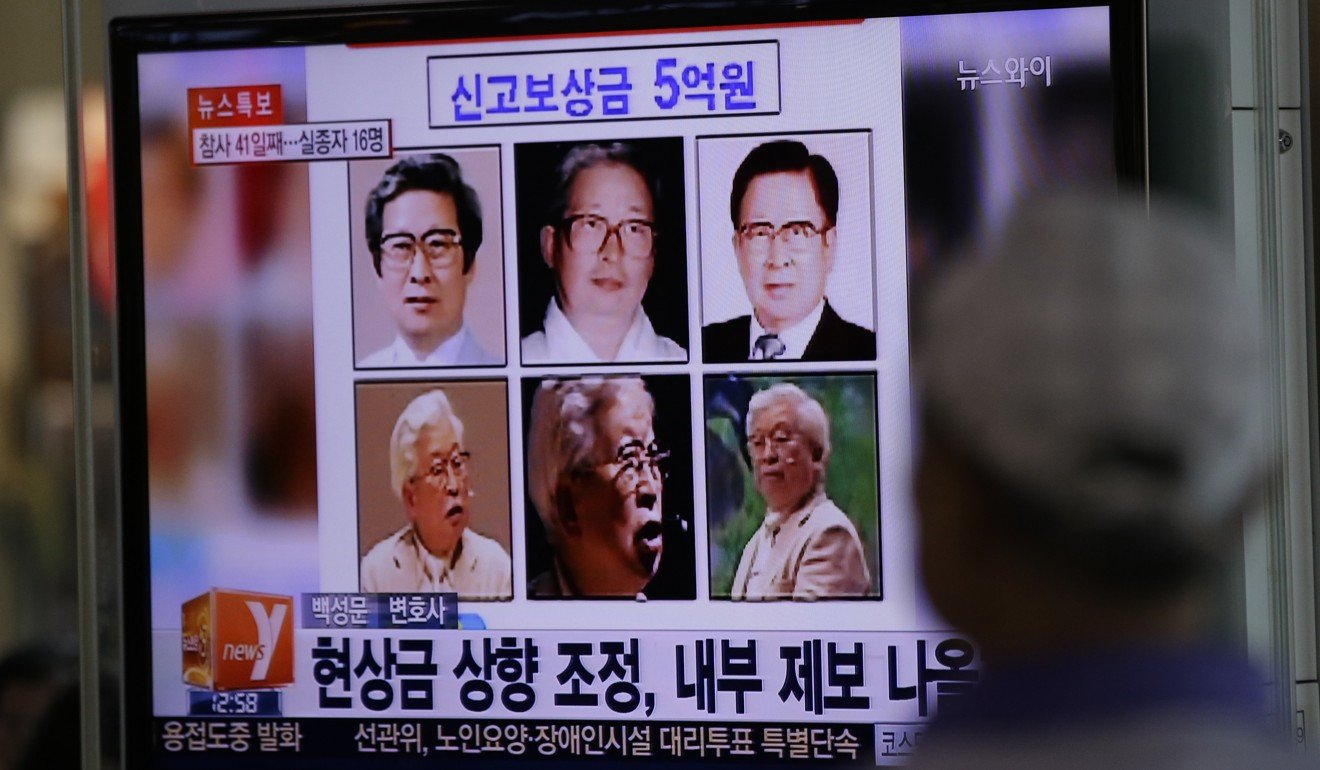 South Korea television news broadcasts the reward poster for Yoo Byung-eun in 29014. Photo: AP