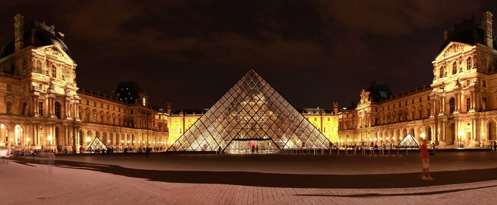 A night view of the Louvre glass pyramid in Paris, France, designed by the late architect Ieoh Ming Pei. Photo: Xinhua